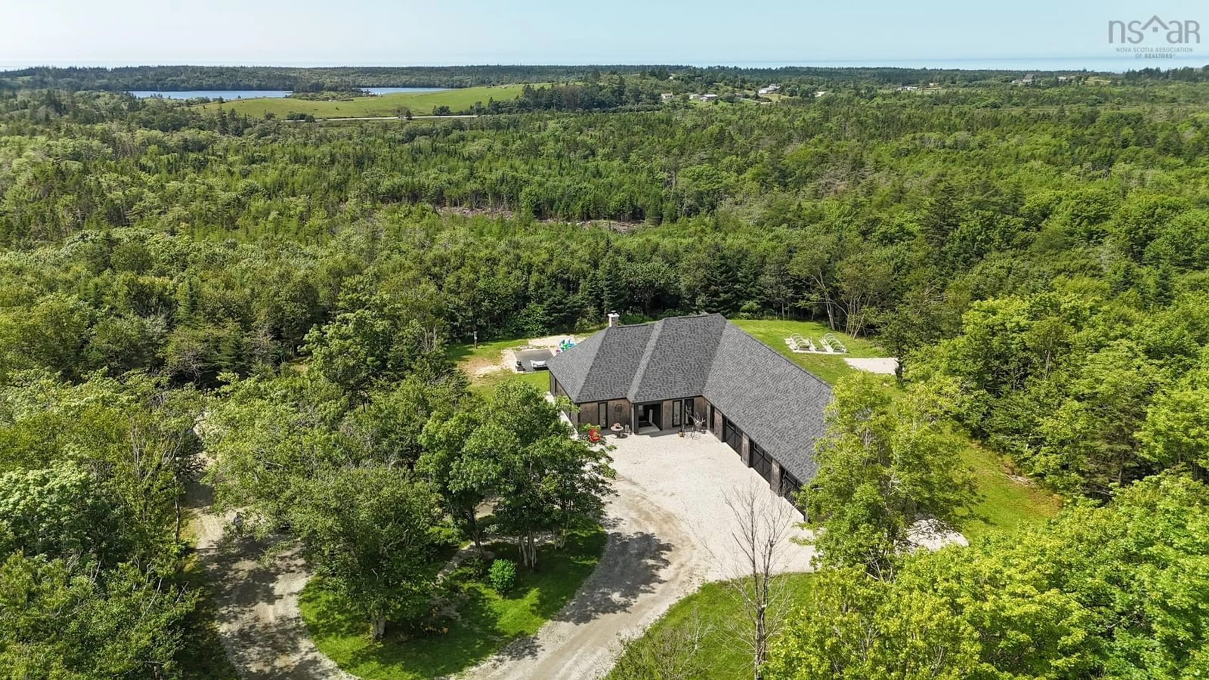 A pic from outside/outdoor area/front of a property/back of a property/a pic from drone, water/lake/river/ocean view for 319 Edson Foote Rd, North Chegoggin Nova Scotia B5A 5K6