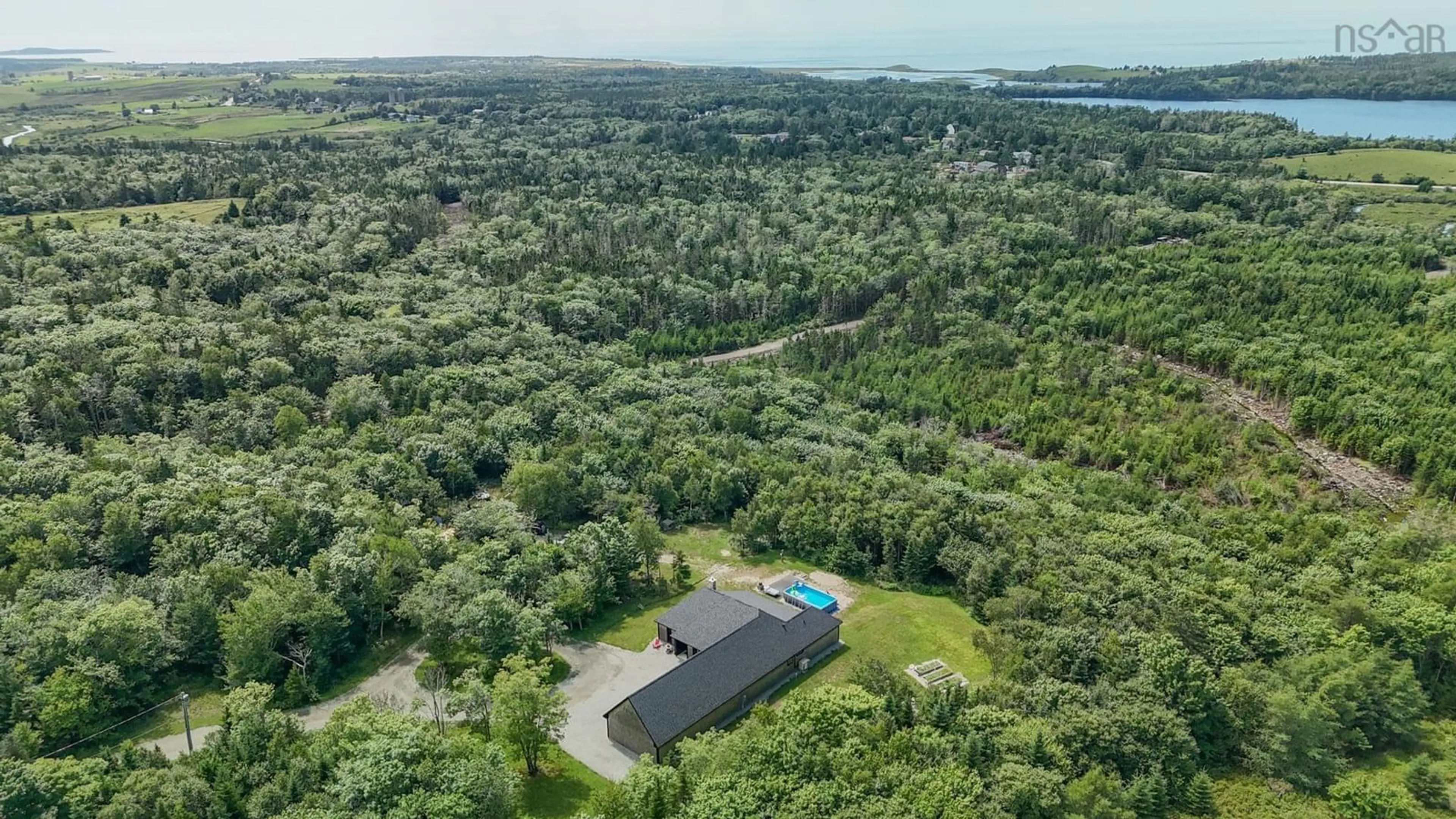 A pic from outside/outdoor area/front of a property/back of a property/a pic from drone, forest/trees view for 319 Edson Foote Rd, North Chegoggin Nova Scotia B5A 5K6