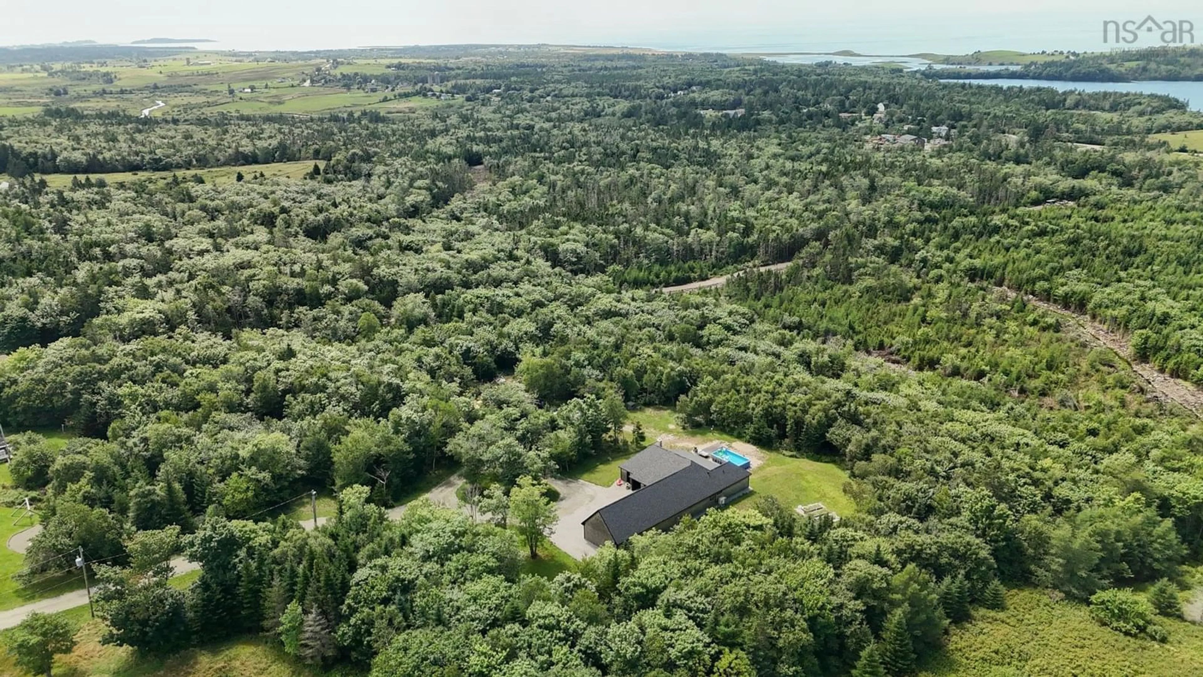 A pic from outside/outdoor area/front of a property/back of a property/a pic from drone, forest/trees view for 319 Edson Foote Rd, North Chegoggin Nova Scotia B5A 5K6