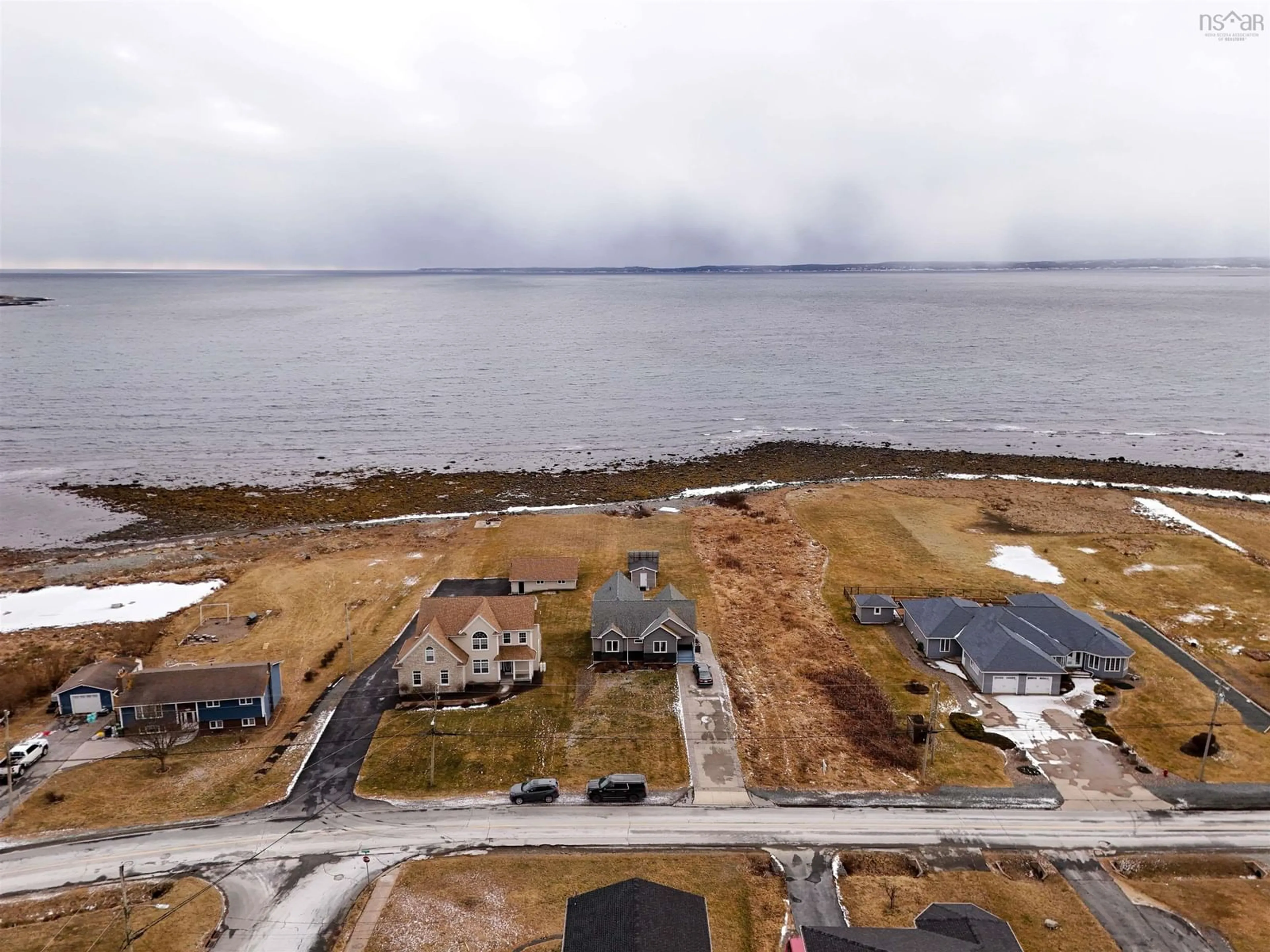 A pic from outside/outdoor area/front of a property/back of a property/a pic from drone, water/lake/river/ocean view for 2257 Shore Road, Eastern Passage Nova Scotia B3G 1H6