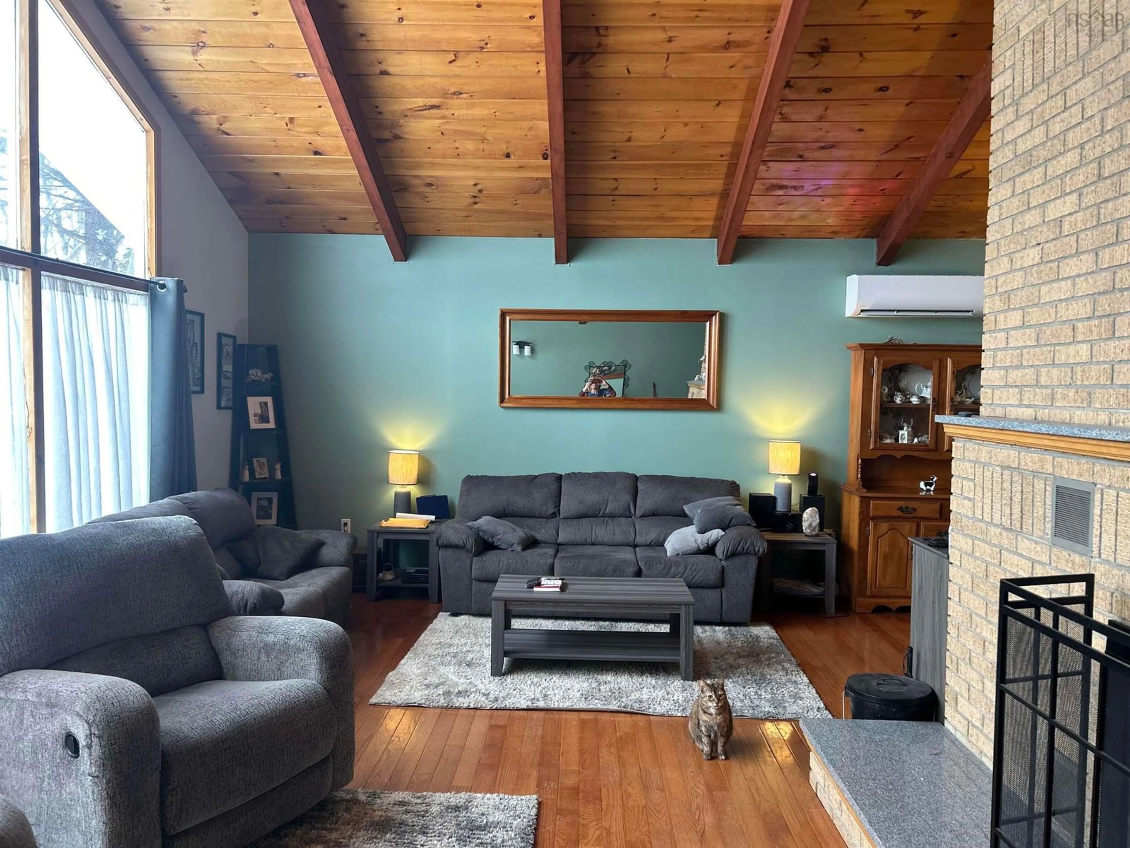 Living room with furniture, wood/laminate floor for 11 Collins Dr, North Sydney Nova Scotia B2A 3R5