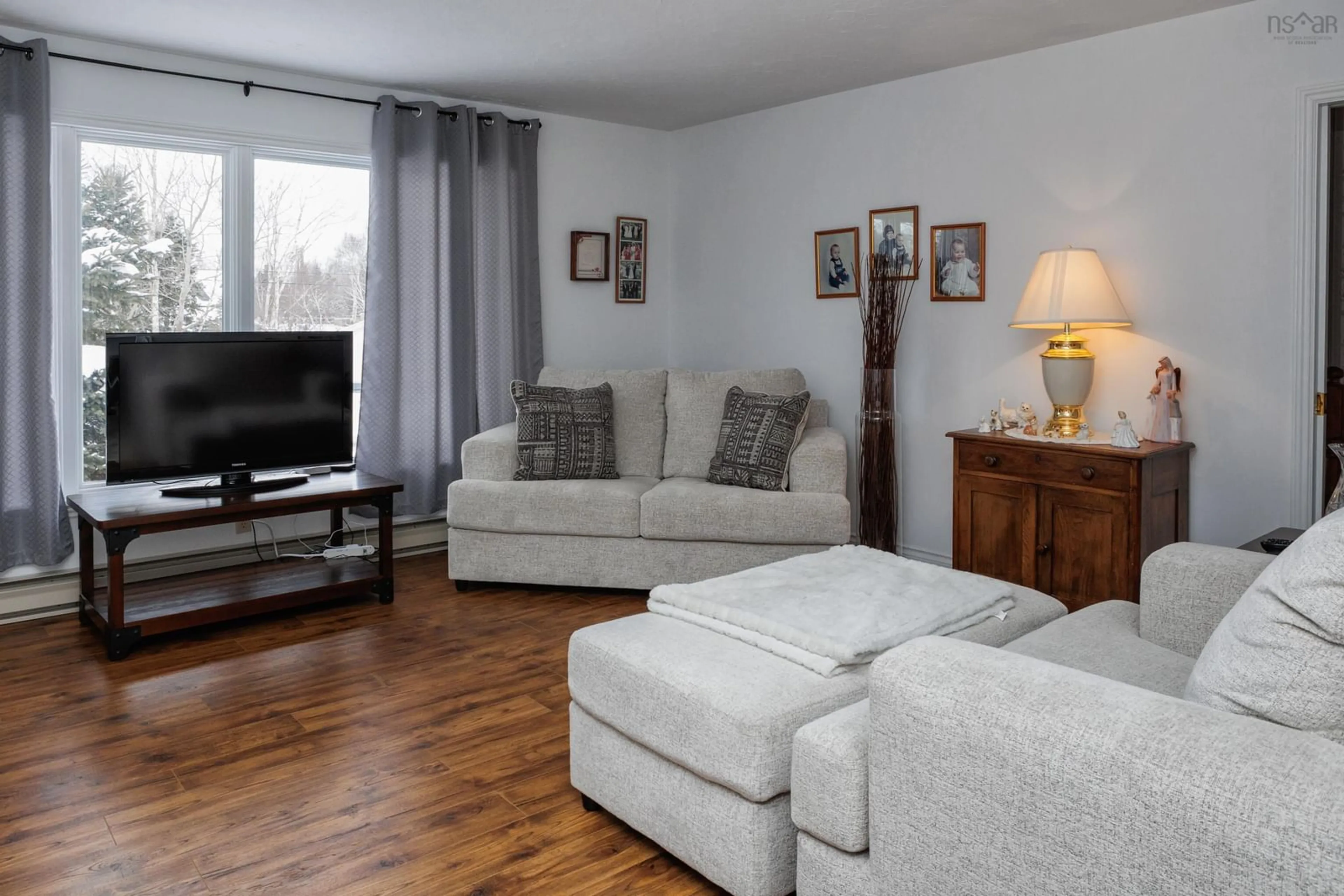 Living room with furniture, wood/laminate floor for 61 Regency Point Dr, Bible Hill Nova Scotia B6L 4B5