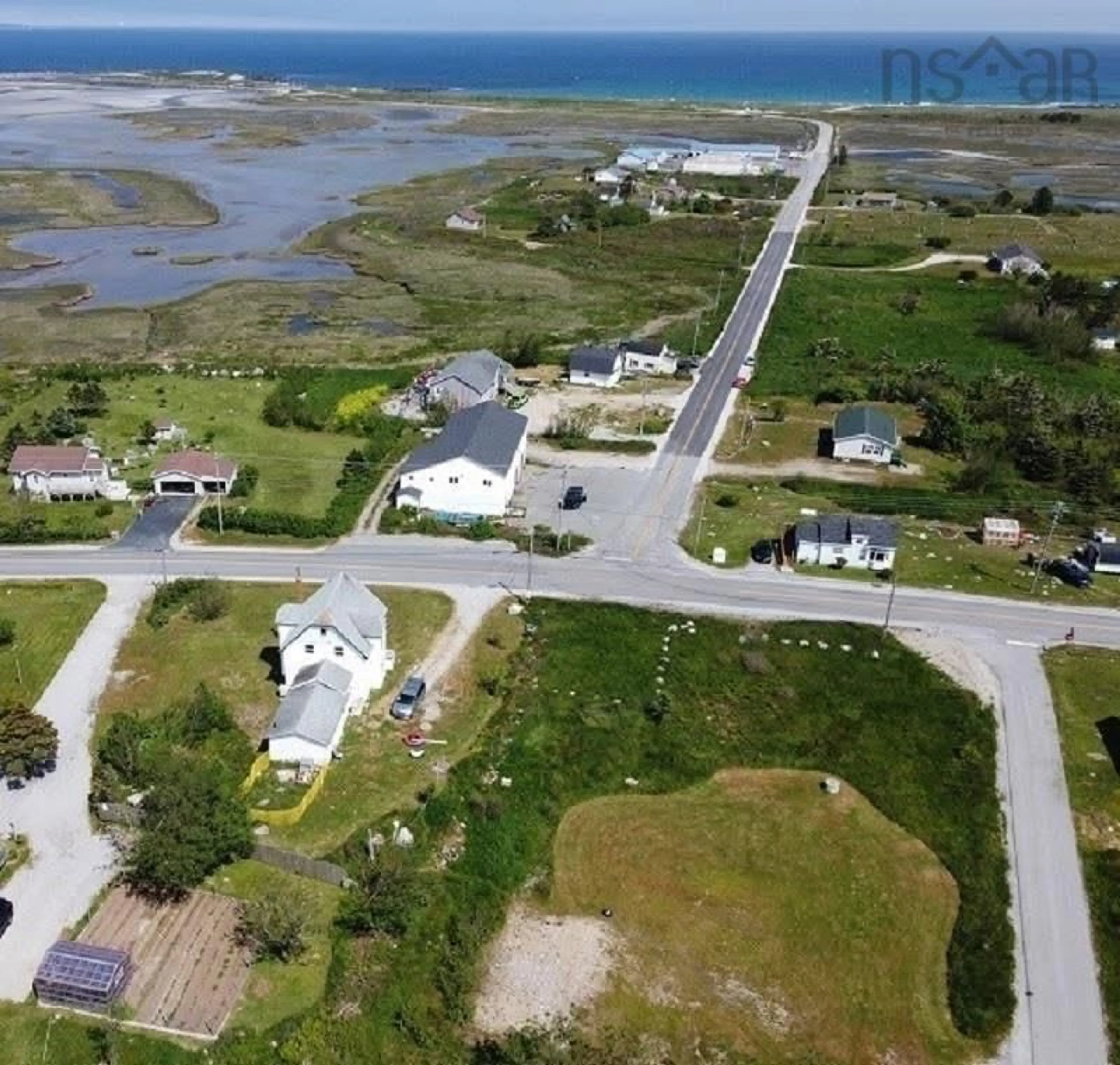 A pic from outside/outdoor area/front of a property/back of a property/a pic from drone, water/lake/river/ocean view for 812 Centerville South Side Rd, Clark's Harbour Nova Scotia B0W 1P0