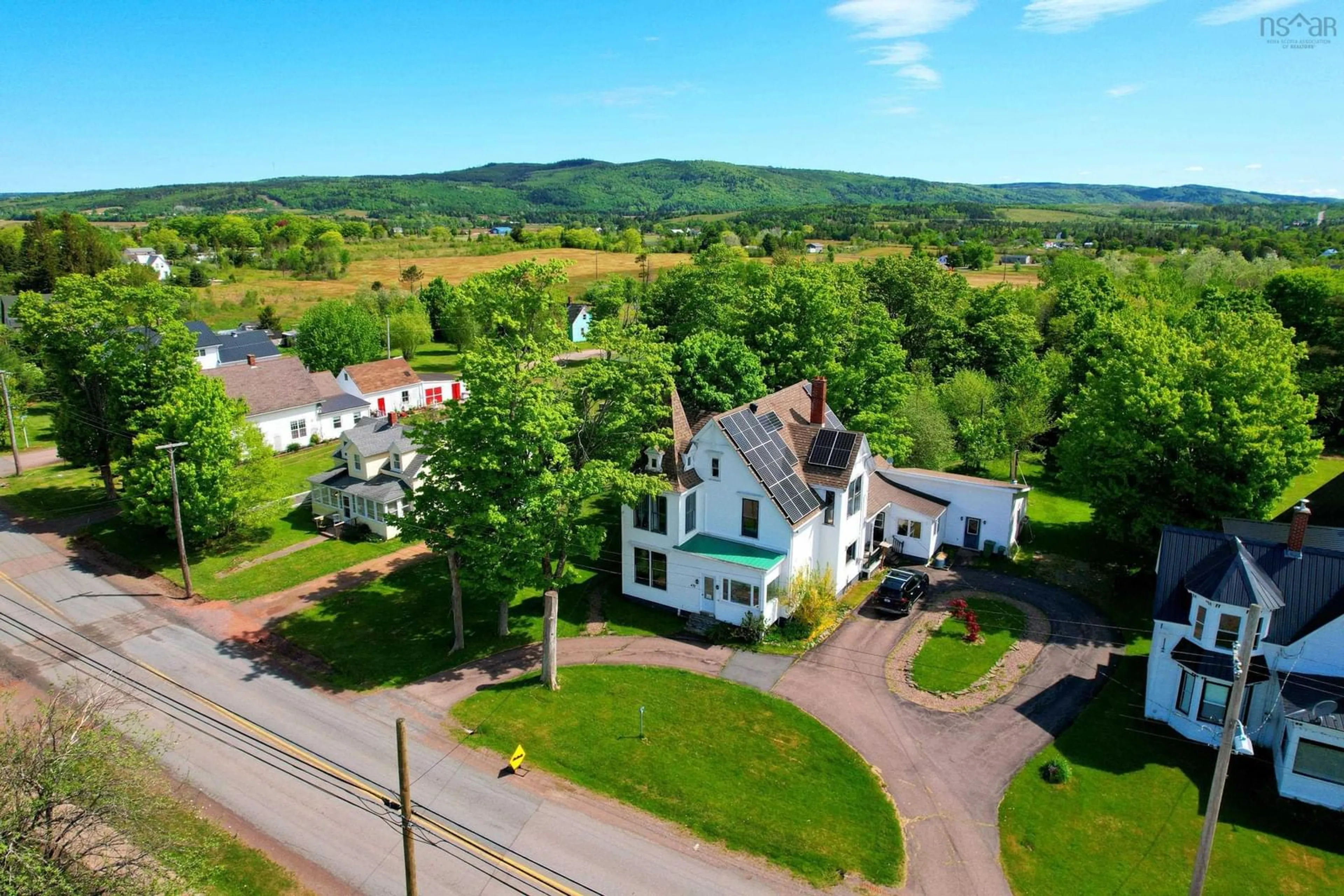 A pic from outside/outdoor area/front of a property/back of a property/a pic from drone, mountain view for 472 Main St, Parrsboro Nova Scotia B0M 1S0