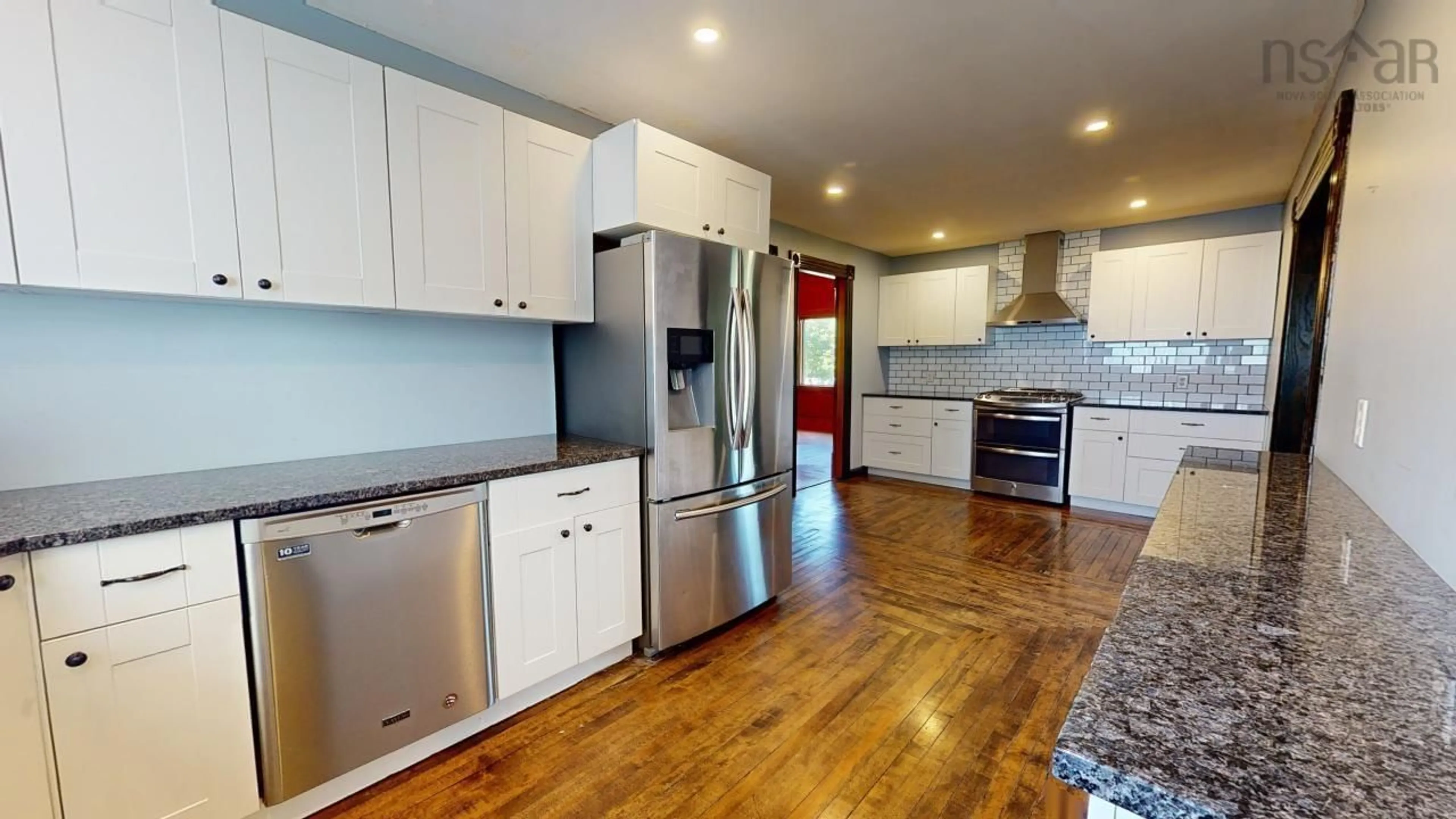 Open concept kitchen, wood/laminate floor for 472 Main St, Parrsboro Nova Scotia B0M 1S0