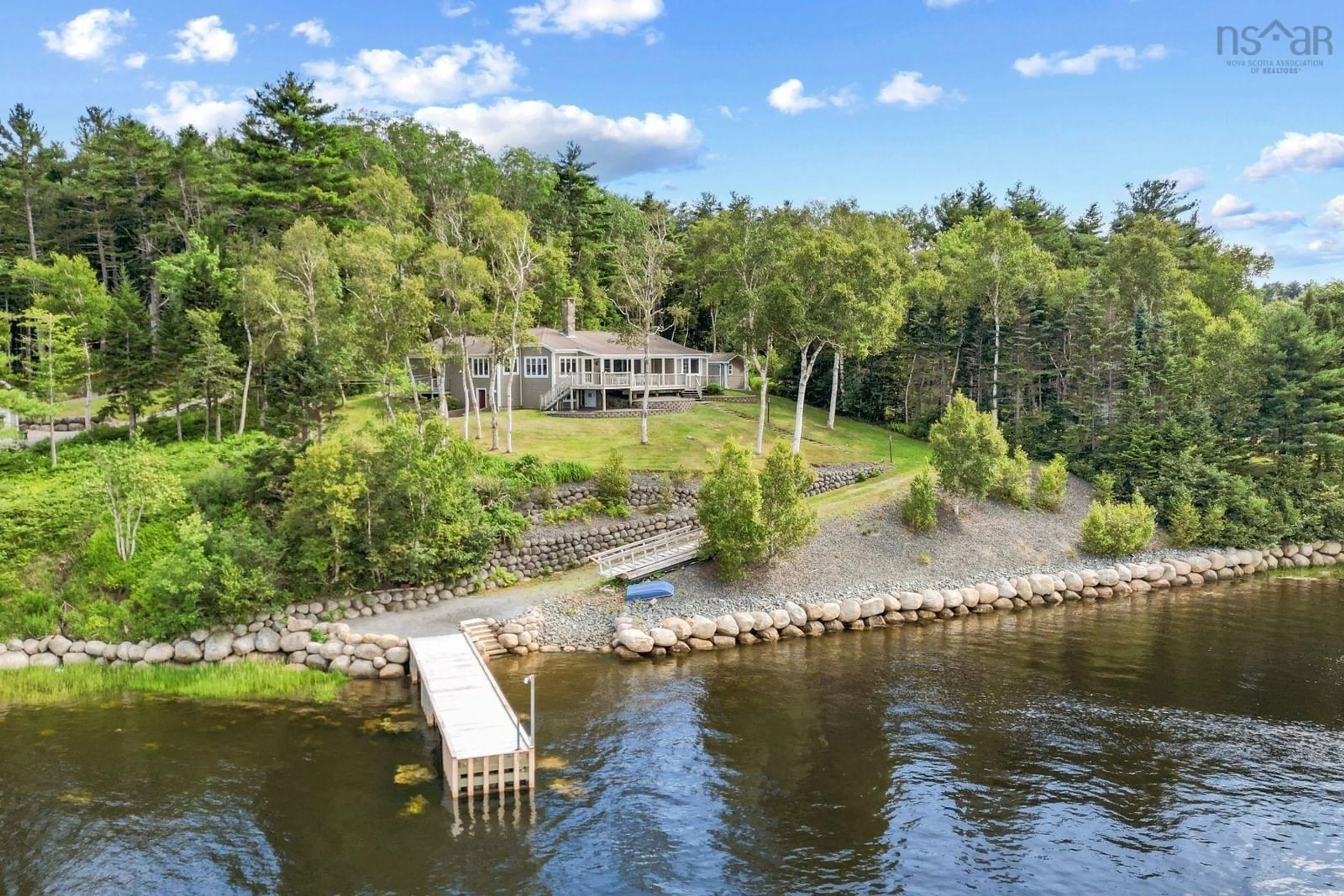 A pic from outside/outdoor area/front of a property/back of a property/a pic from drone, water/lake/river/ocean view for 143 Millers Head Rd, West Lahave Nova Scotia B0R 1G0