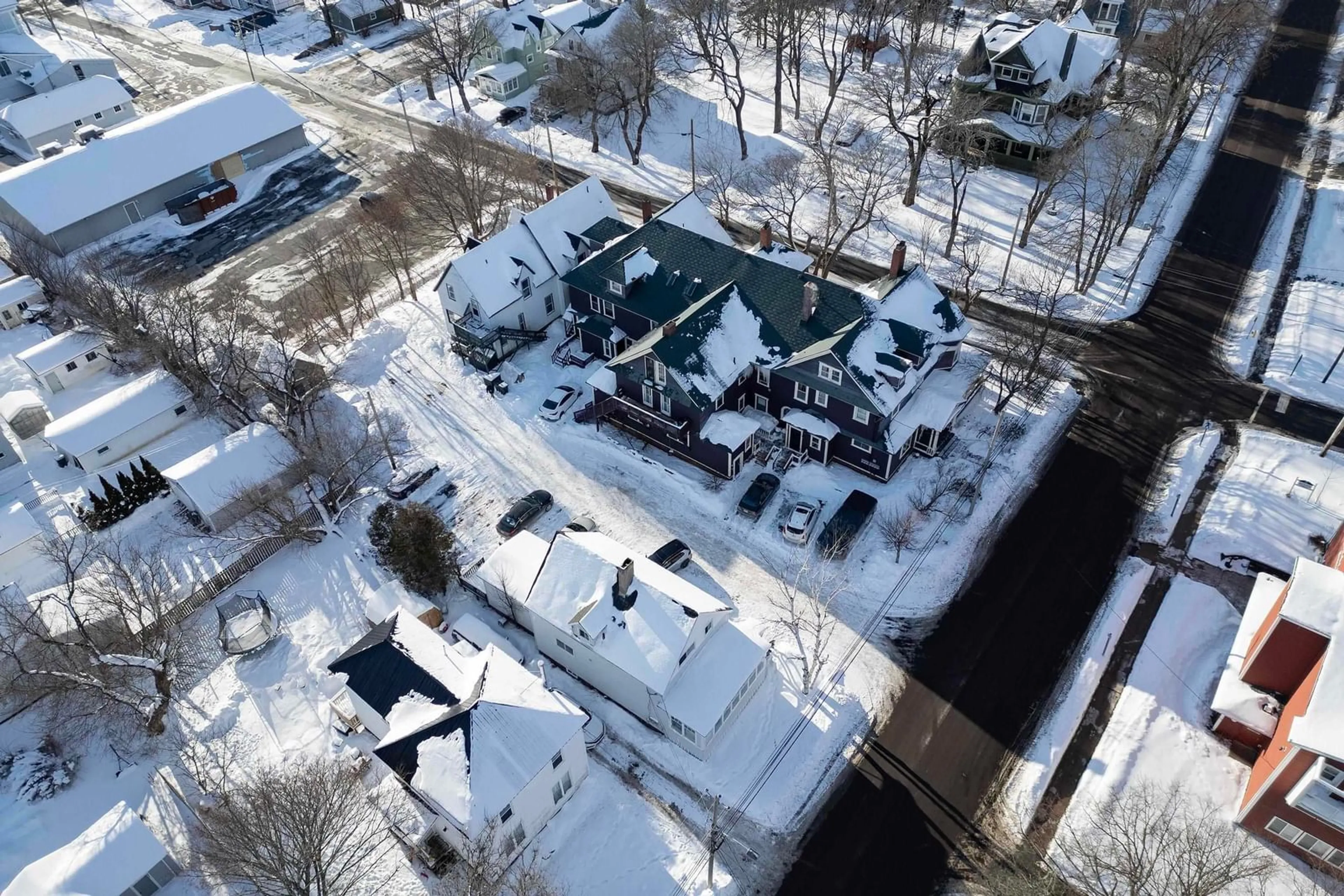 A pic from outside/outdoor area/front of a property/back of a property/a pic from drone, street for 11 Robie St, Amherst Nova Scotia B4H 3K3