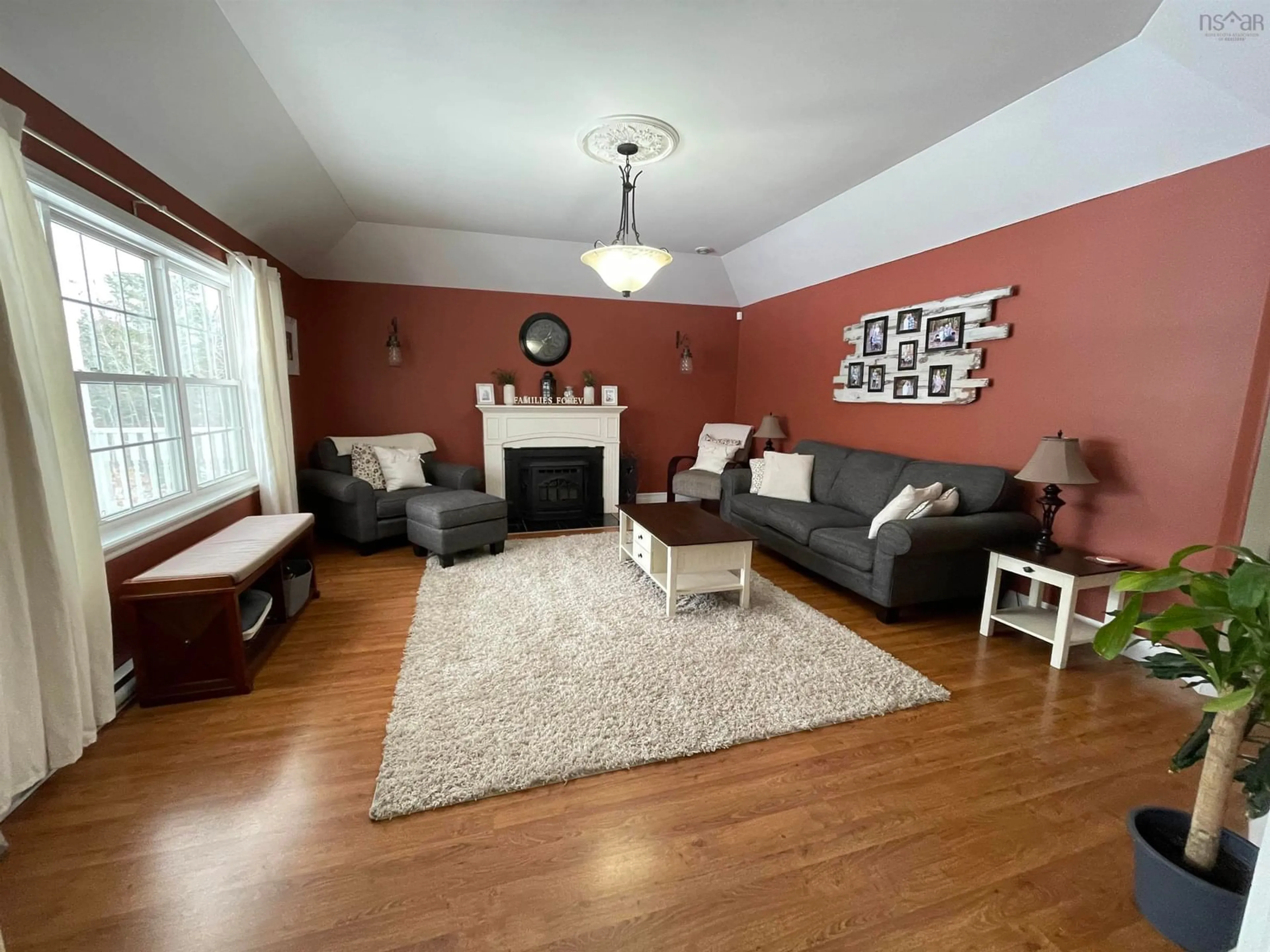 Living room with furniture, wood/laminate floor for 129 Thomas St, Enfield Nova Scotia B2T 1T7