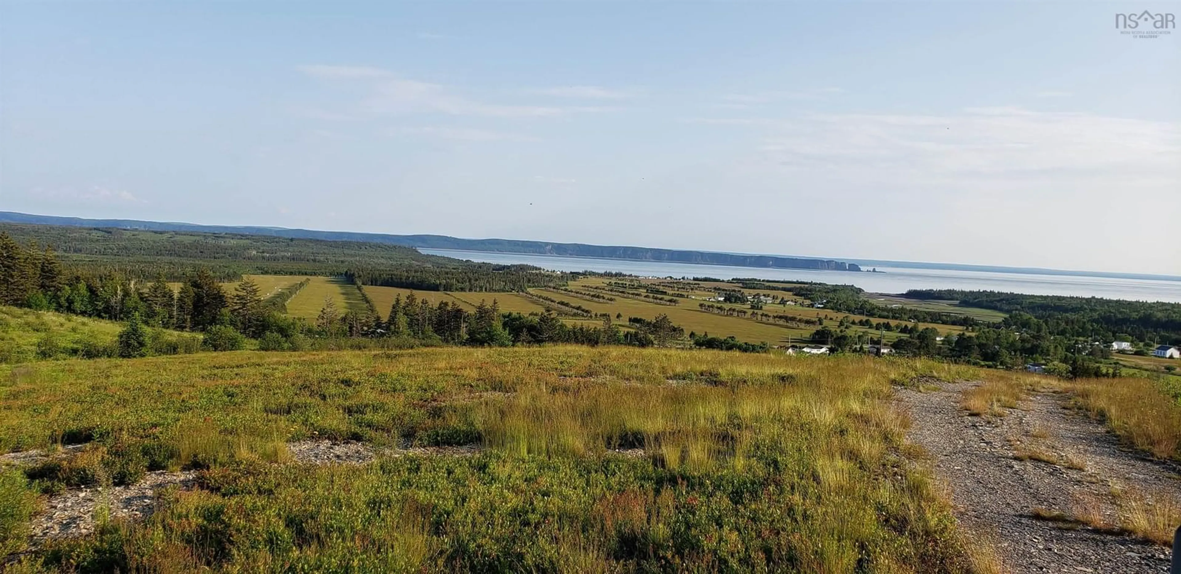 A pic from outside/outdoor area/front of a property/back of a property/a pic from drone, water/lake/river/ocean view for 44 Confederation Rd, Diligent River Nova Scotia B0M 1S0