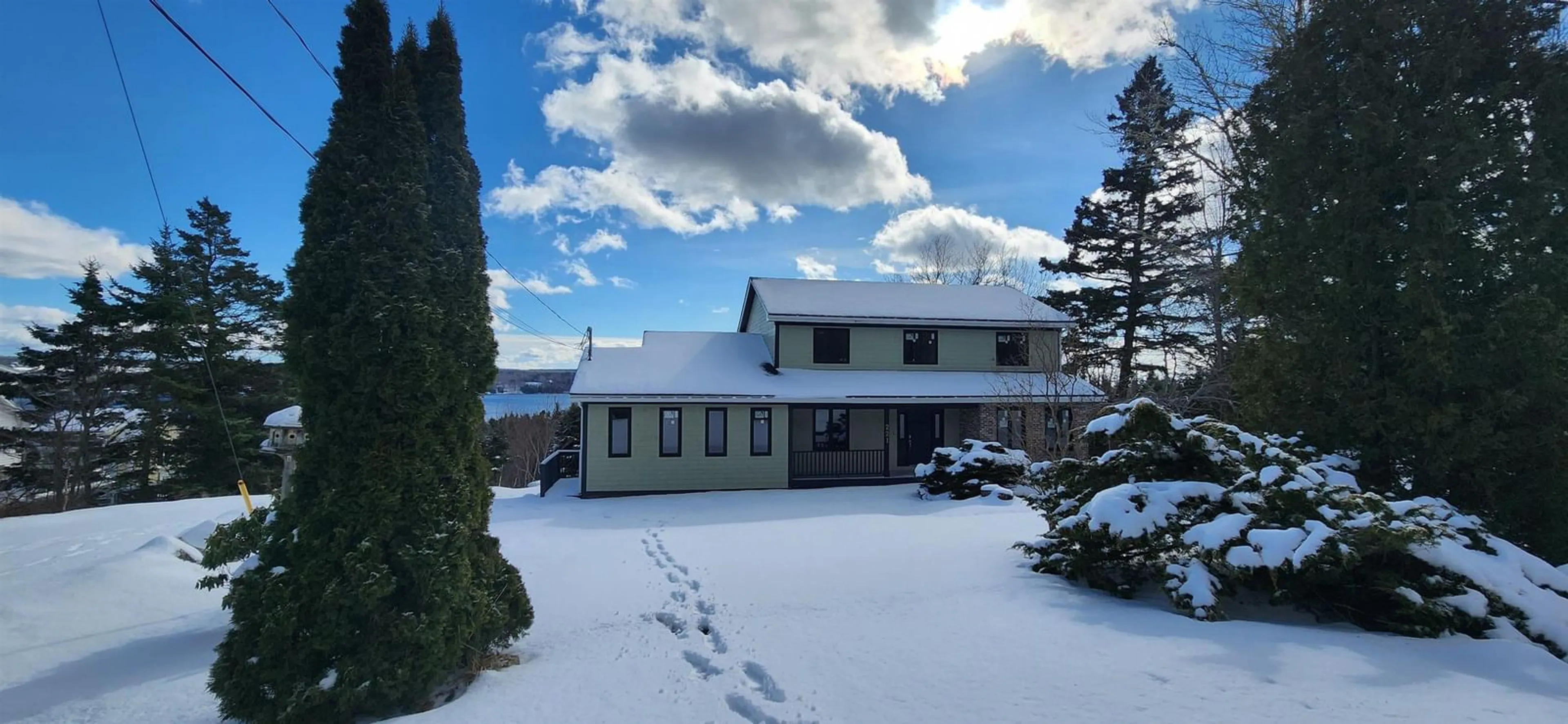 A pic from outside/outdoor area/front of a property/back of a property/a pic from drone, street for 221 Hillside Drive, Boutiliers Point Nova Scotia B3Z 1W9