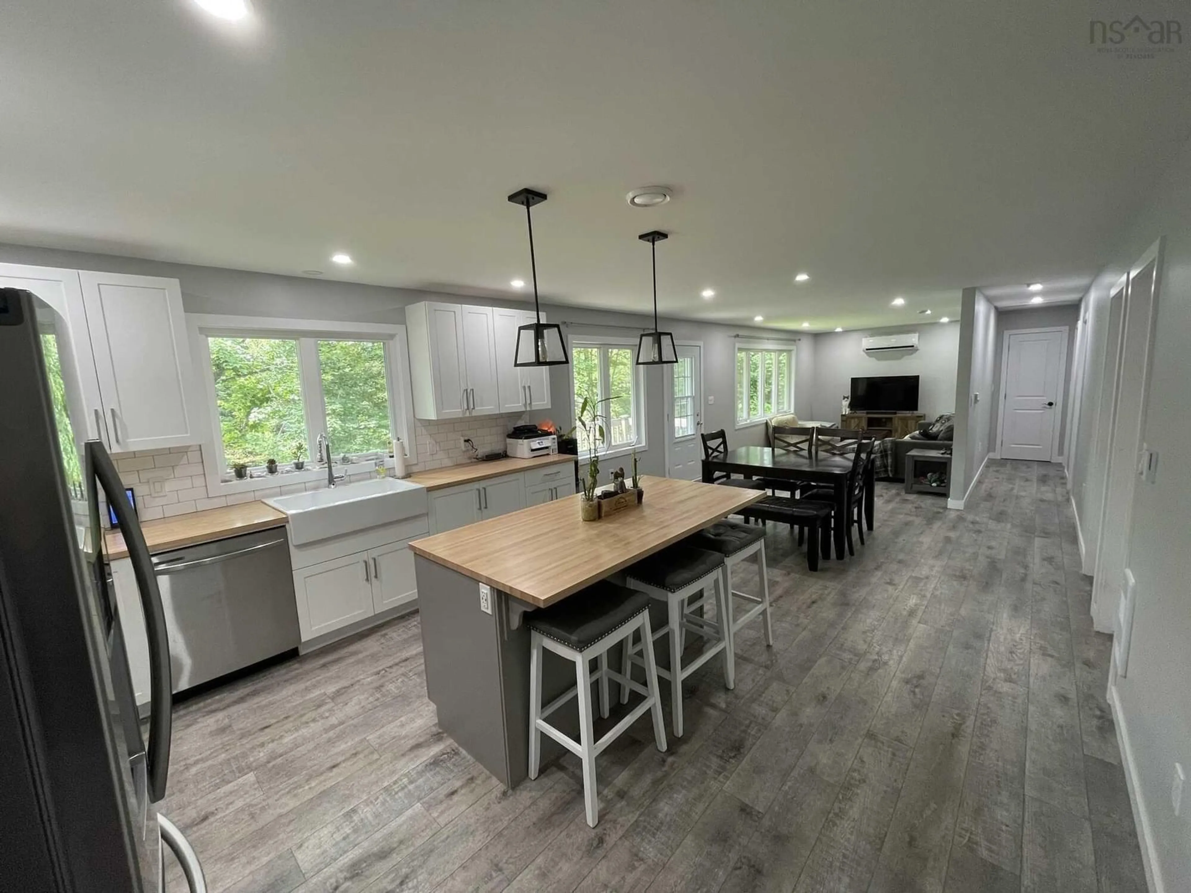 Open concept kitchen, wood/laminate floor for 1268 Cloverville Rd, Antigonish Nova Scotia B2G 2K9