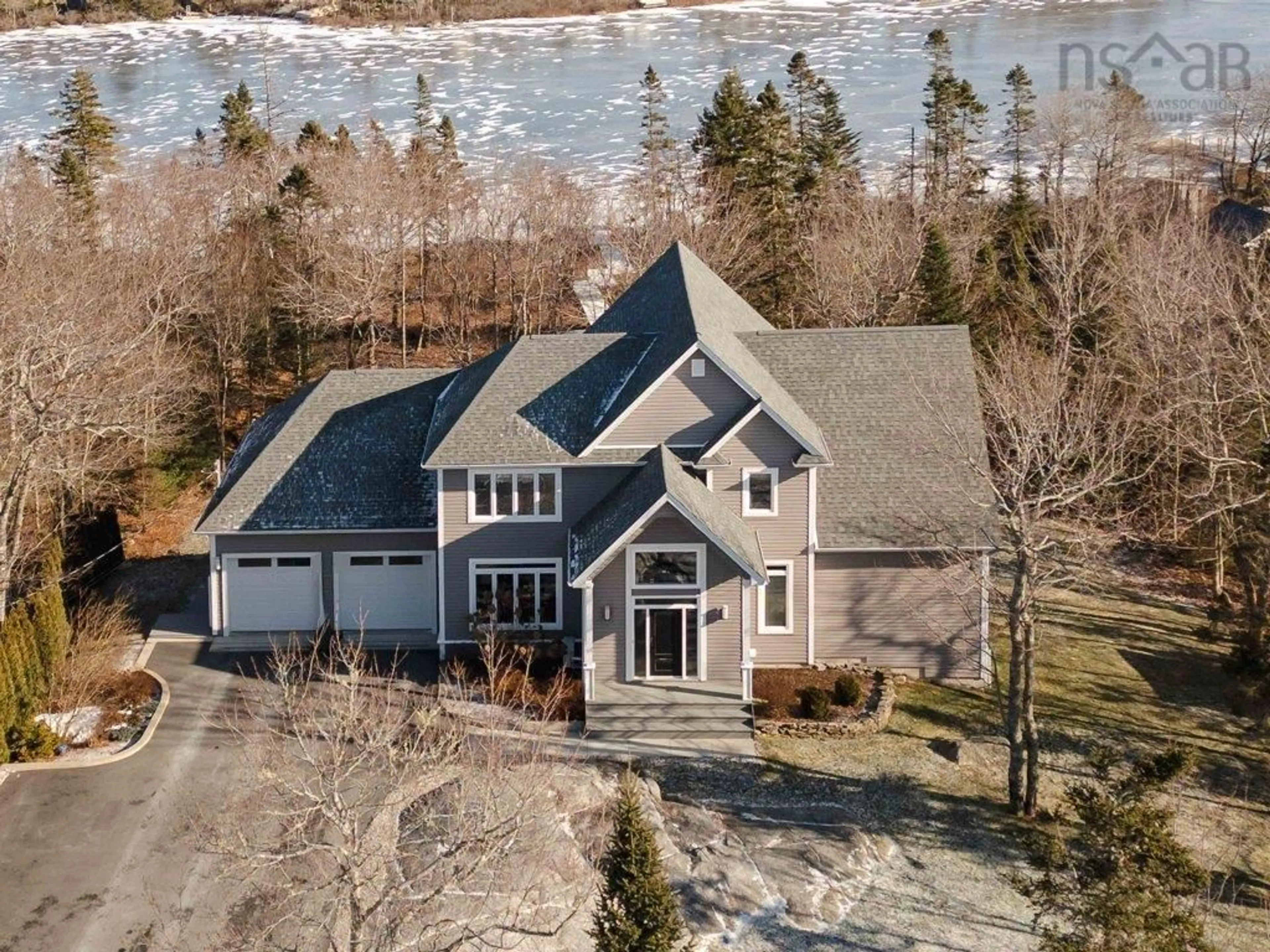 A pic from outside/outdoor area/front of a property/back of a property/a pic from drone, water/lake/river/ocean view for 119 Granite Cove Dr, Hubley Nova Scotia B3Z 0J3