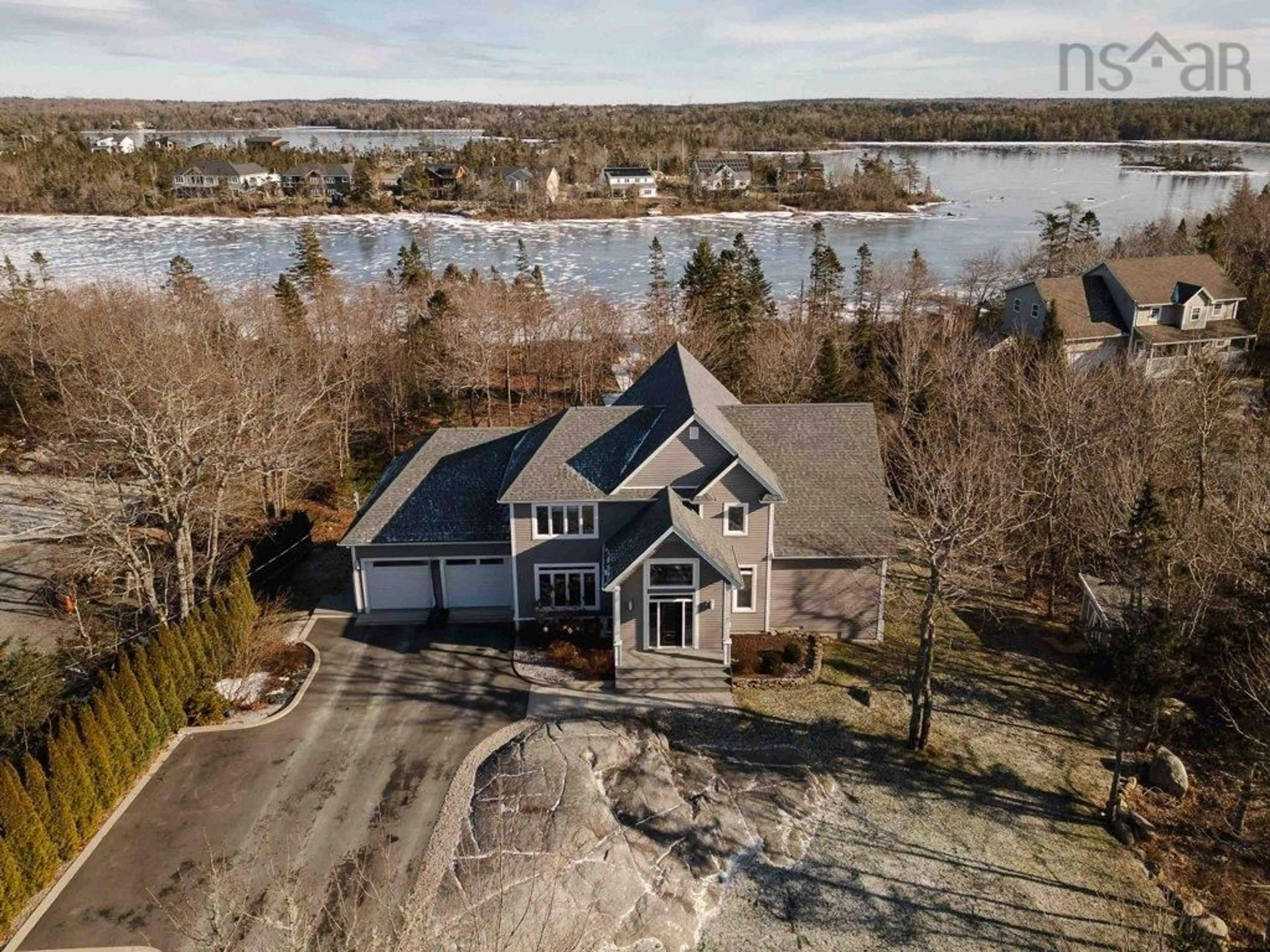 A pic from outside/outdoor area/front of a property/back of a property/a pic from drone, water/lake/river/ocean view for 119 Granite Cove Dr, Hubley Nova Scotia B3Z 0J3