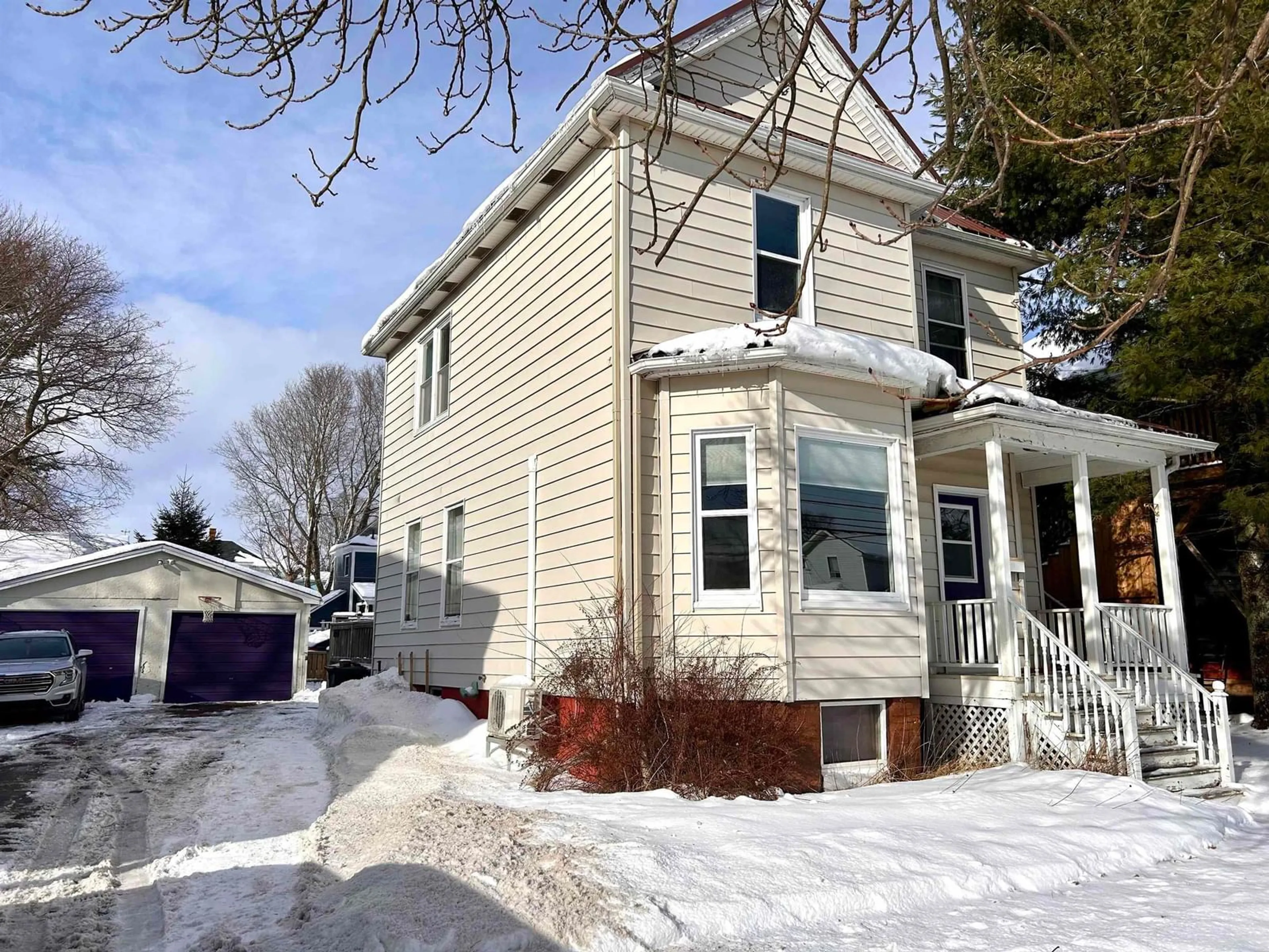 Home with vinyl exterior material, street for 68 Spring St, Amherst Nova Scotia B4H 1S5