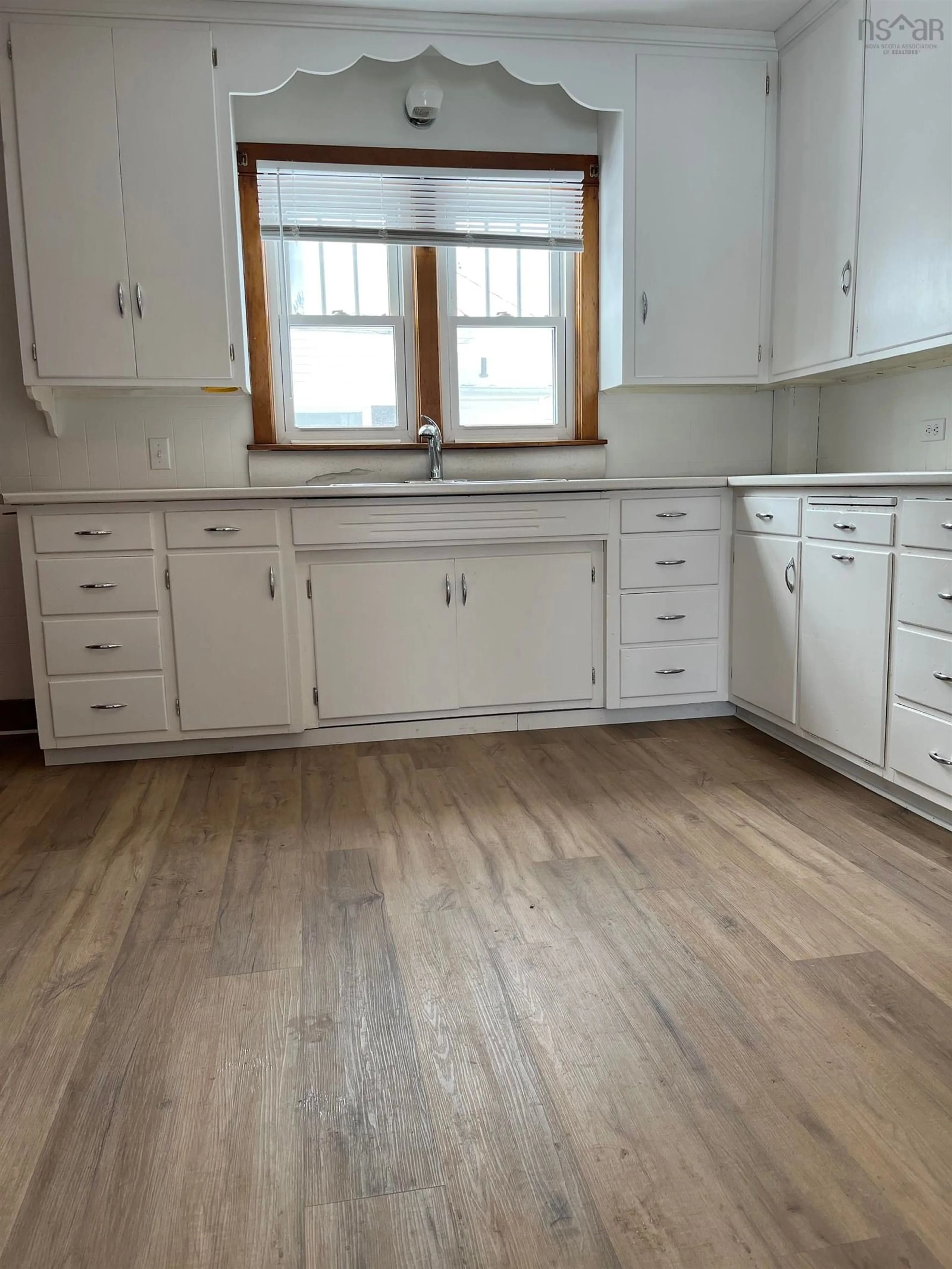 Open concept kitchen, wood/laminate floor for 95 Pictou Rd, Bible Hill Nova Scotia B2N 2S2