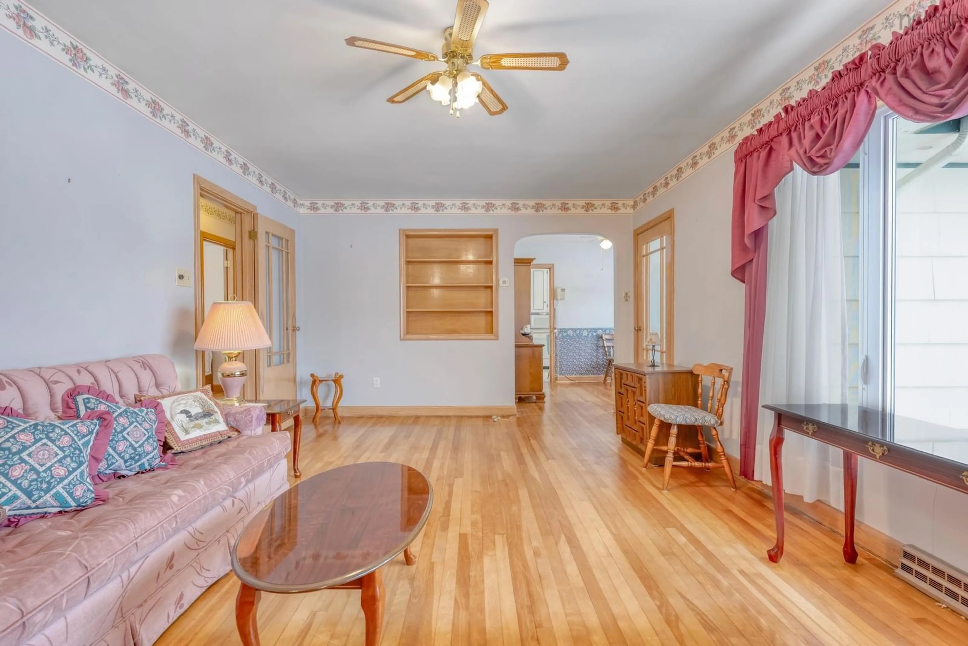 Living room with furniture, wood/laminate floor for 143 Brook St, Lunenburg Nova Scotia B0J 2C0