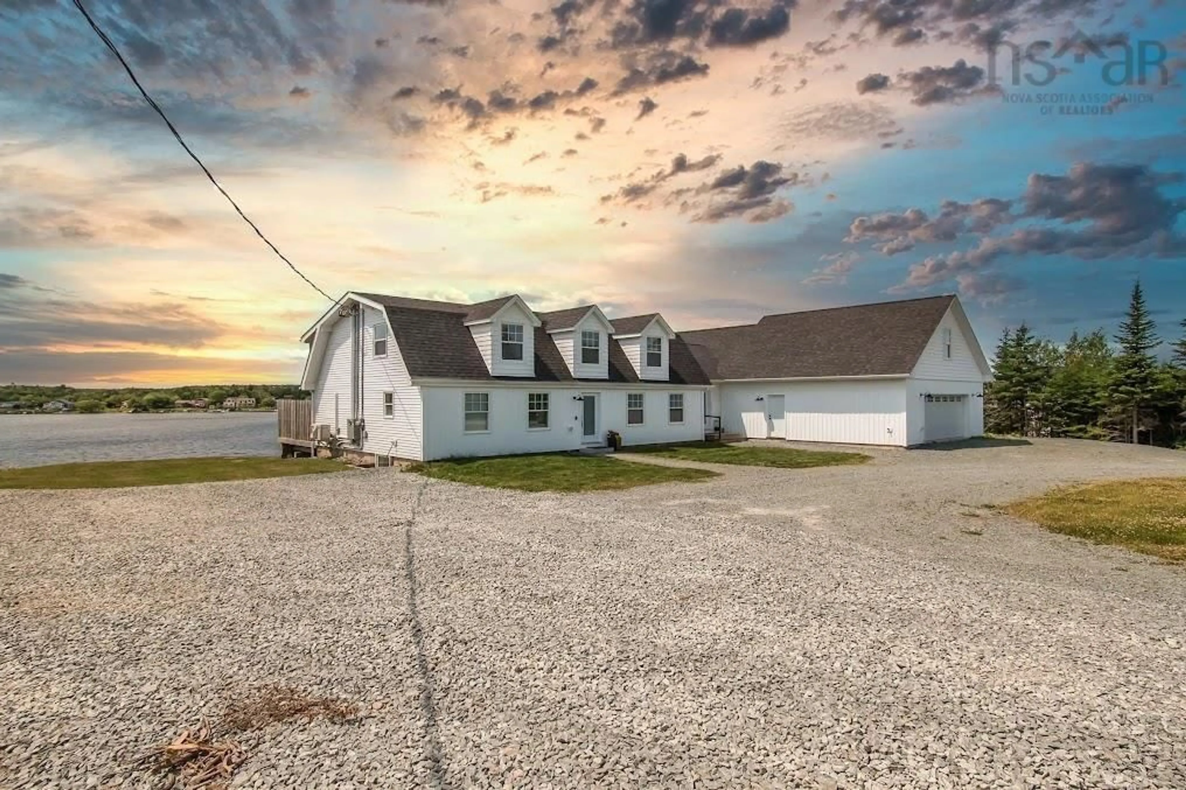 A pic from outside/outdoor area/front of a property/back of a property/a pic from drone, water/lake/river/ocean view for 103 Capri Drive, West Porters Lake Nova Scotia B3E 1L6