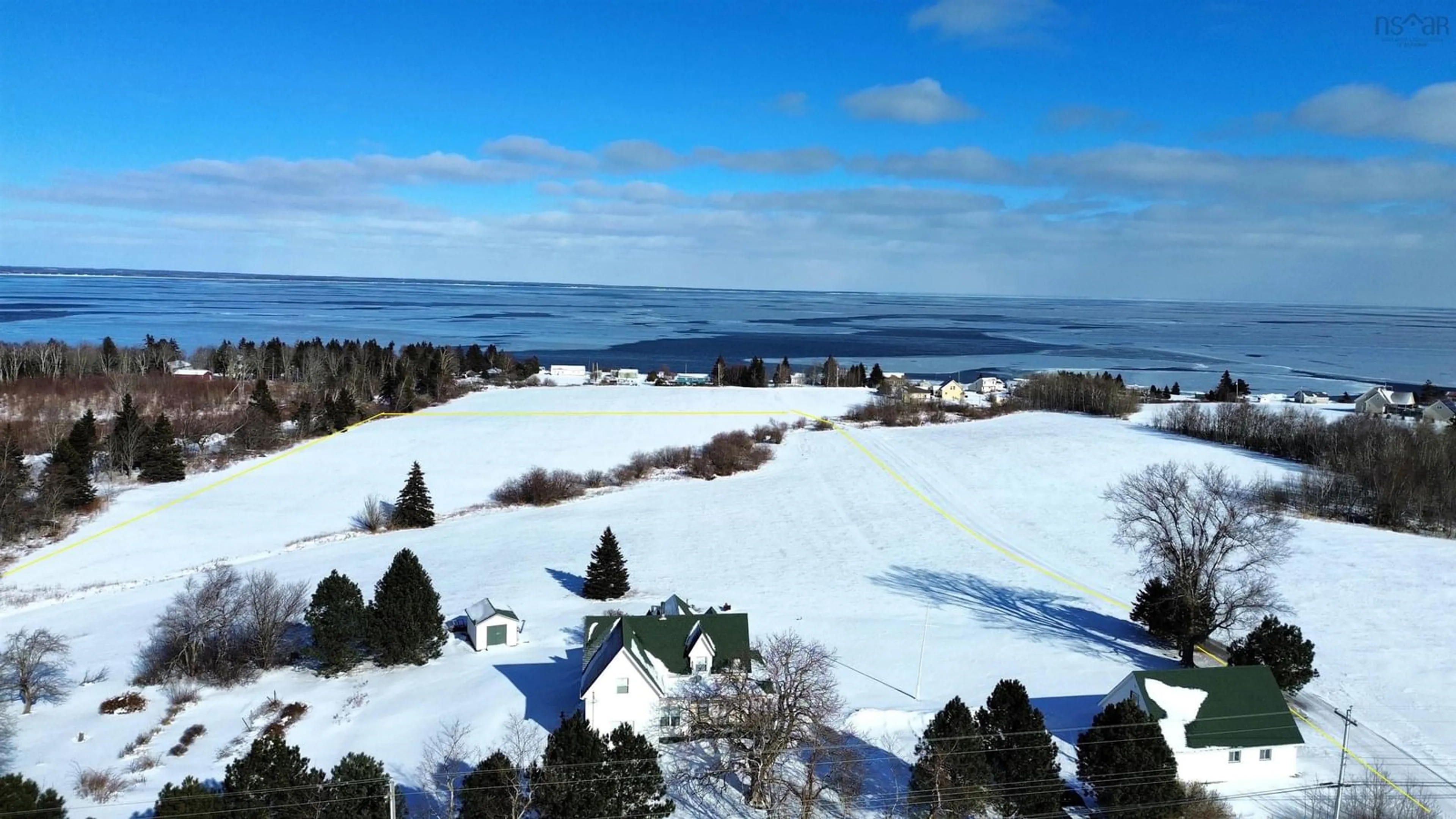 A pic from outside/outdoor area/front of a property/back of a property/a pic from drone, water/lake/river/ocean view for 5939 366 Hwy, Lorneville Nova Scotia B4H 3X9