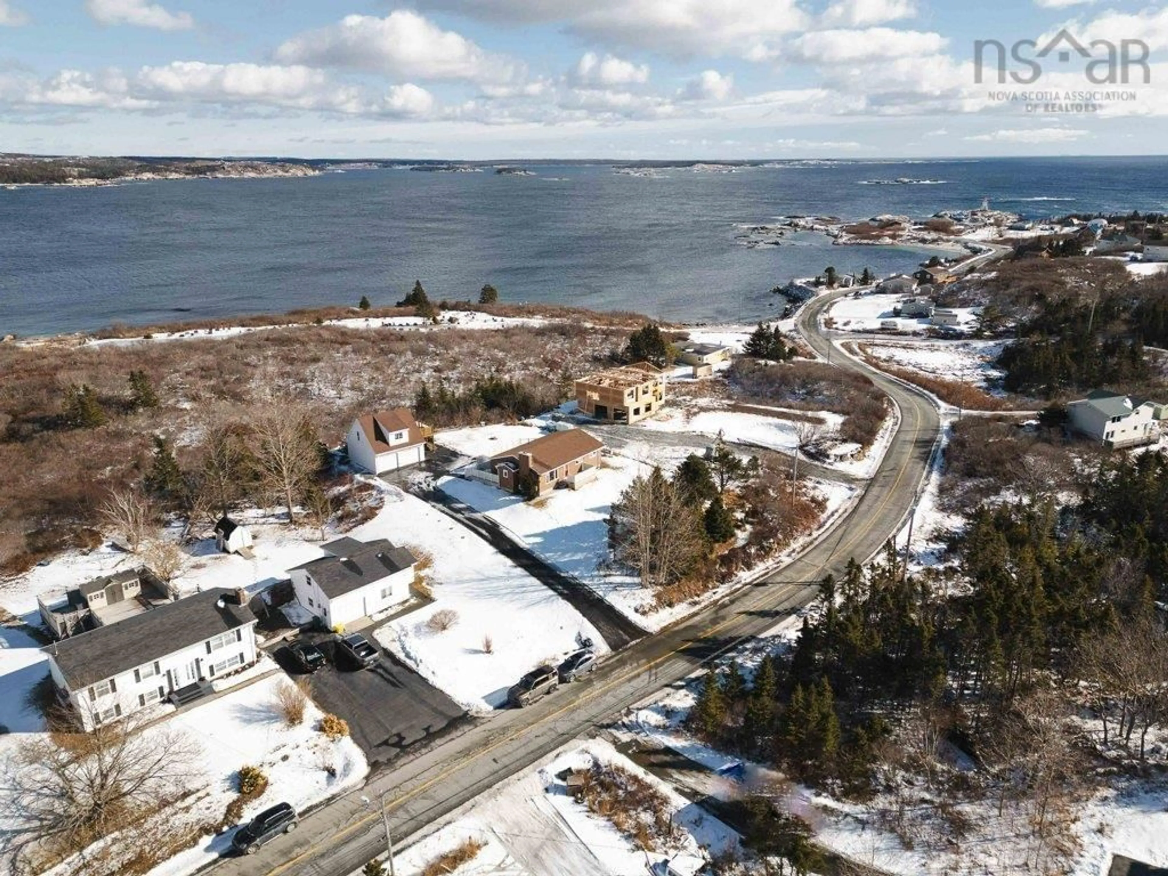 A pic from outside/outdoor area/front of a property/back of a property/a pic from drone, water/lake/river/ocean view for 214 Sandy Cove Rd, Terence Bay Nova Scotia B3T 1Y5