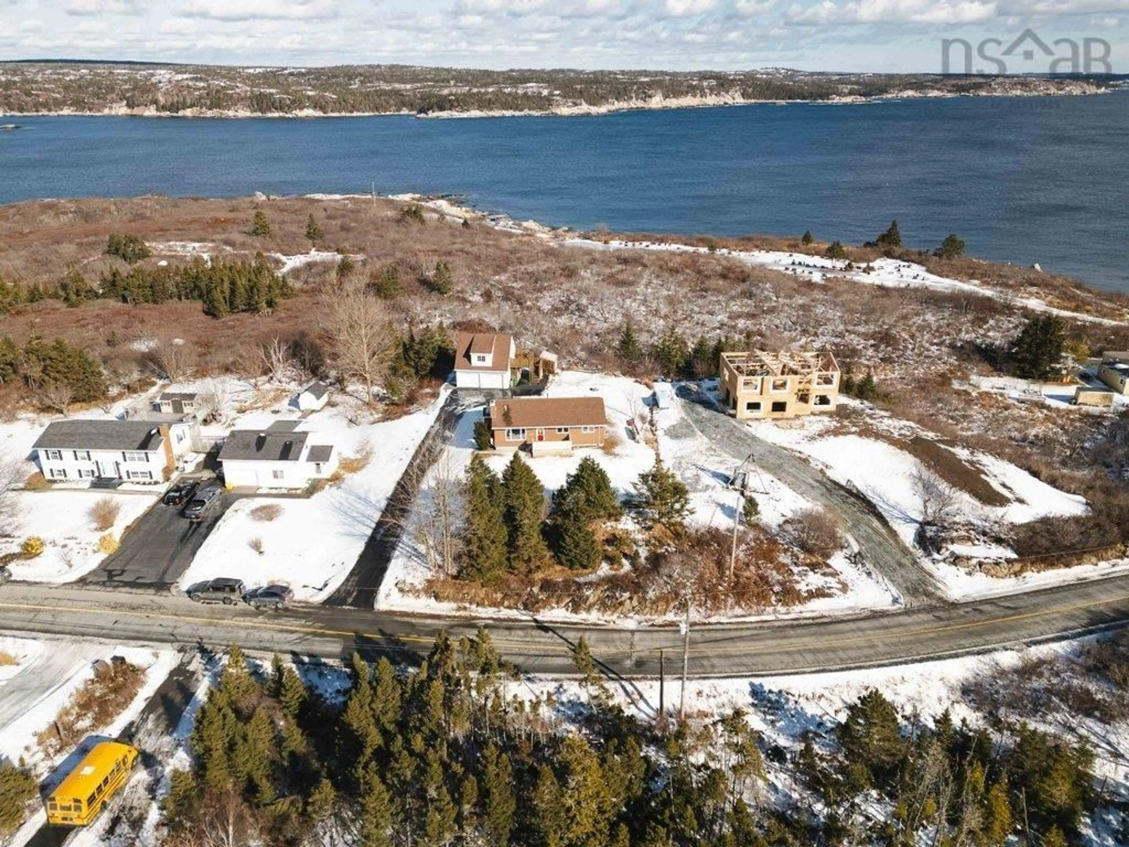 A pic from outside/outdoor area/front of a property/back of a property/a pic from drone, water/lake/river/ocean view for 214 Sandy Cove Rd, Terence Bay Nova Scotia B3T 1Y5