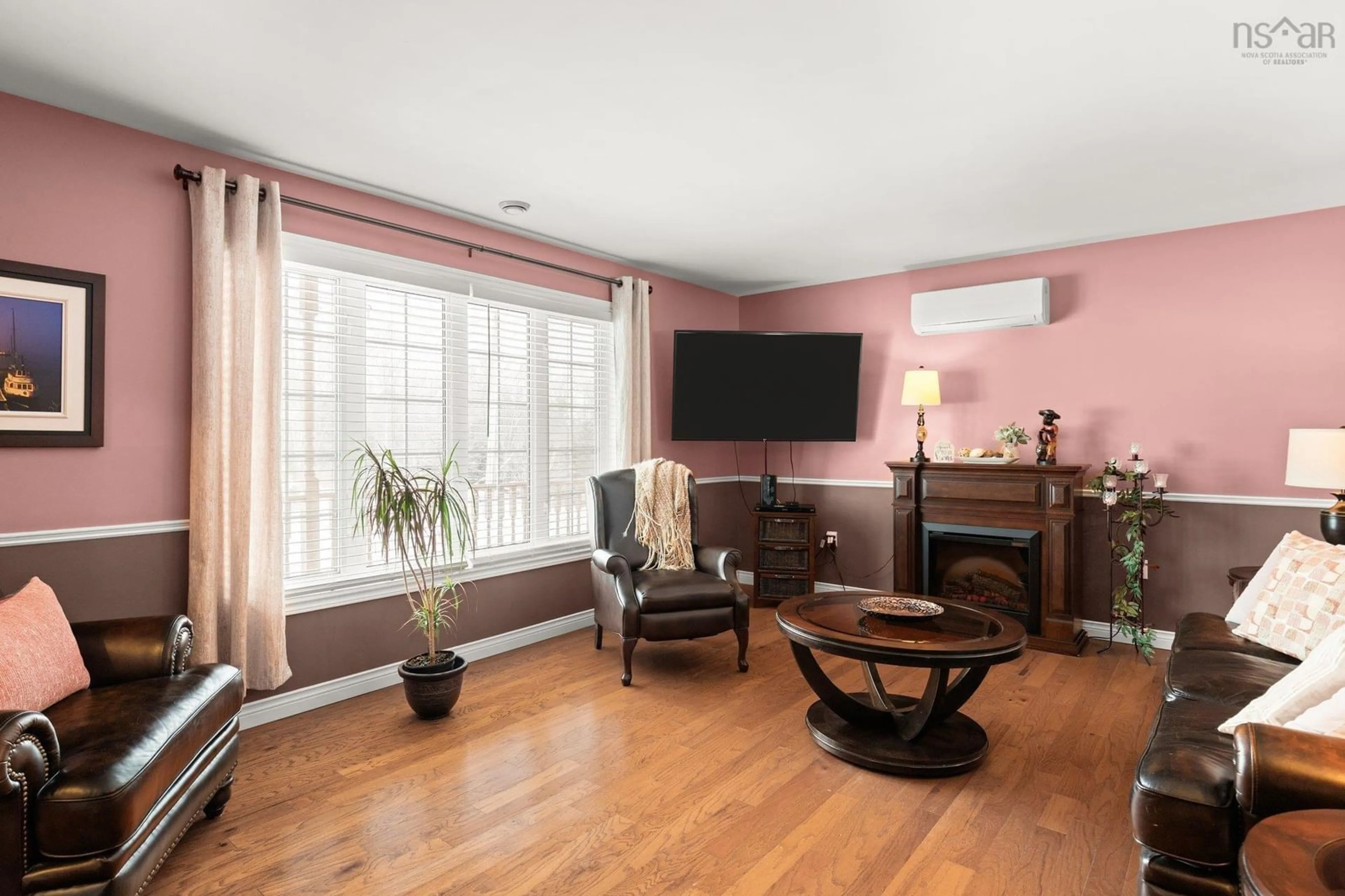 Living room with furniture, wood/laminate floor for 23 Delaney Dr, Beaver Bank Nova Scotia B4G 1E4