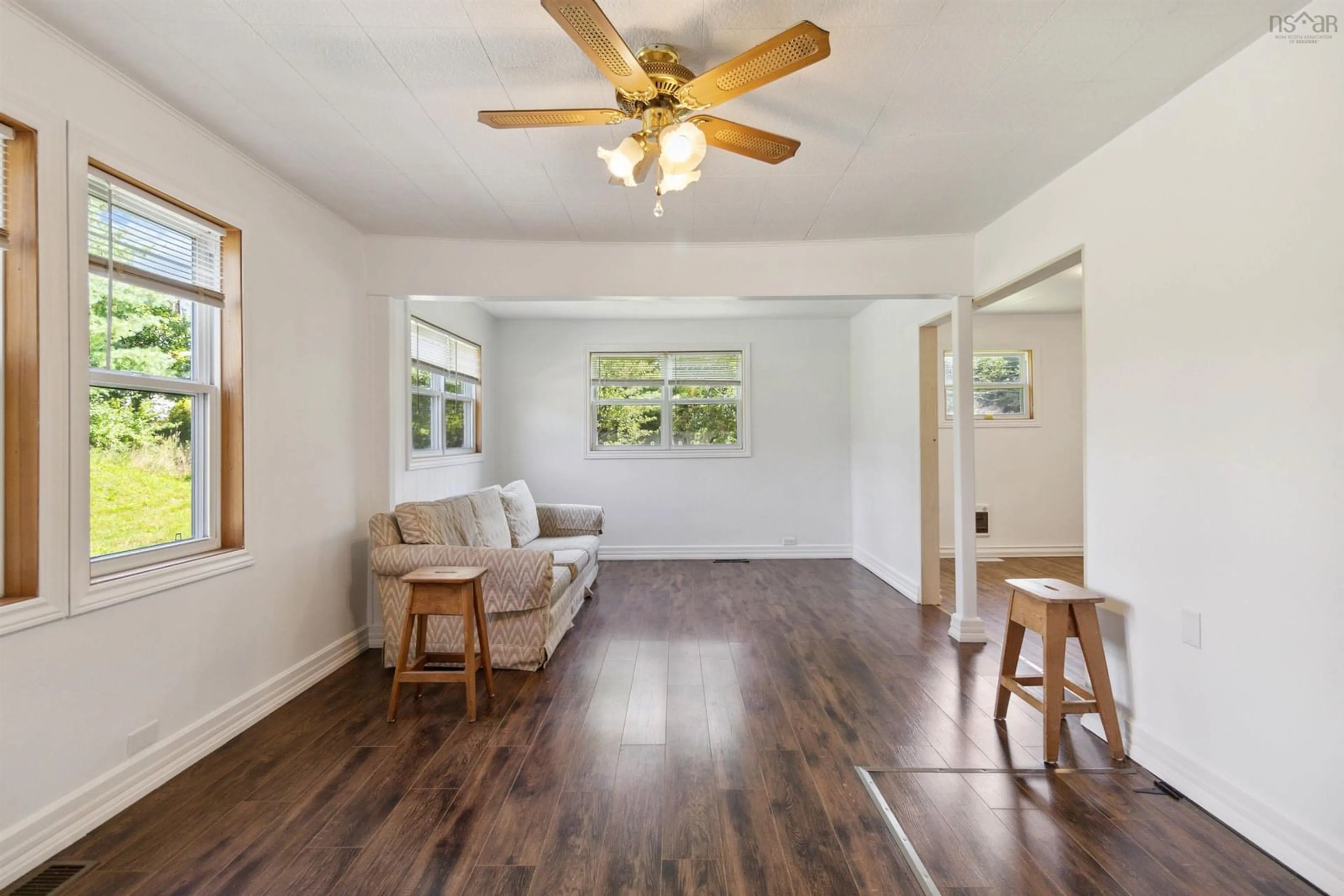 Living room with furniture, wood/laminate floor for 88 Nickerson Pond Rd, Brooklyn Nova Scotia B0T 1K0