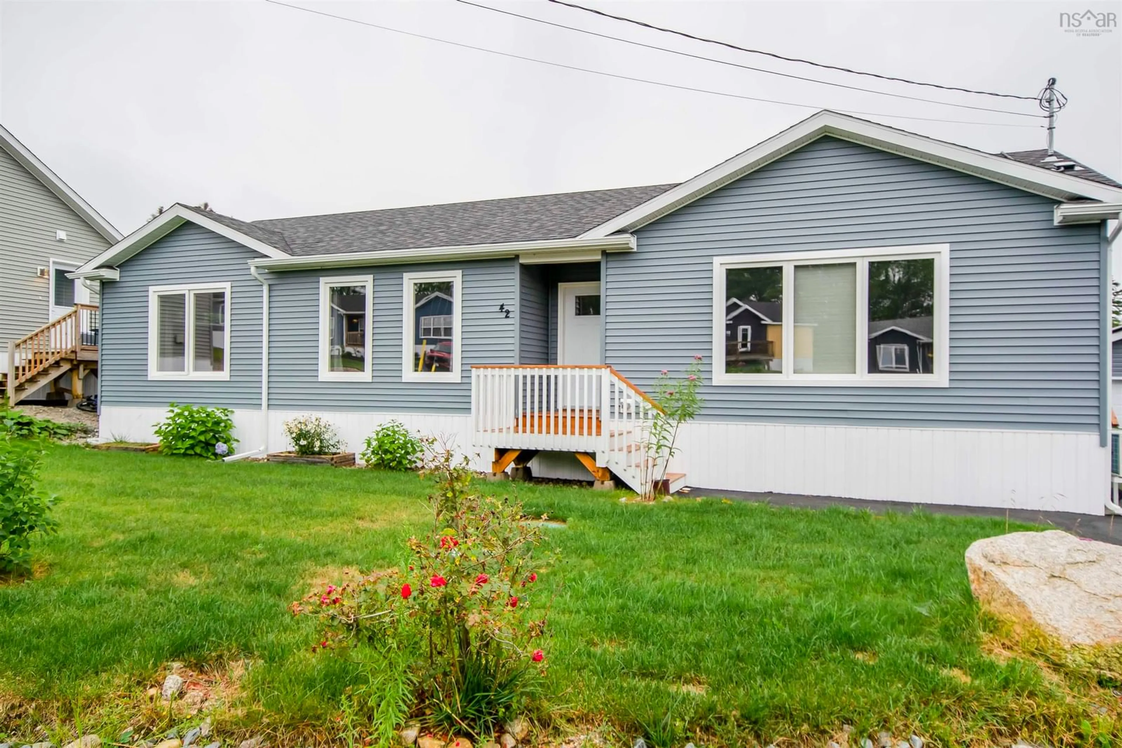 Home with vinyl exterior material, street for 42 Mossberry Close, Hubley Nova Scotia B3Z 0S9