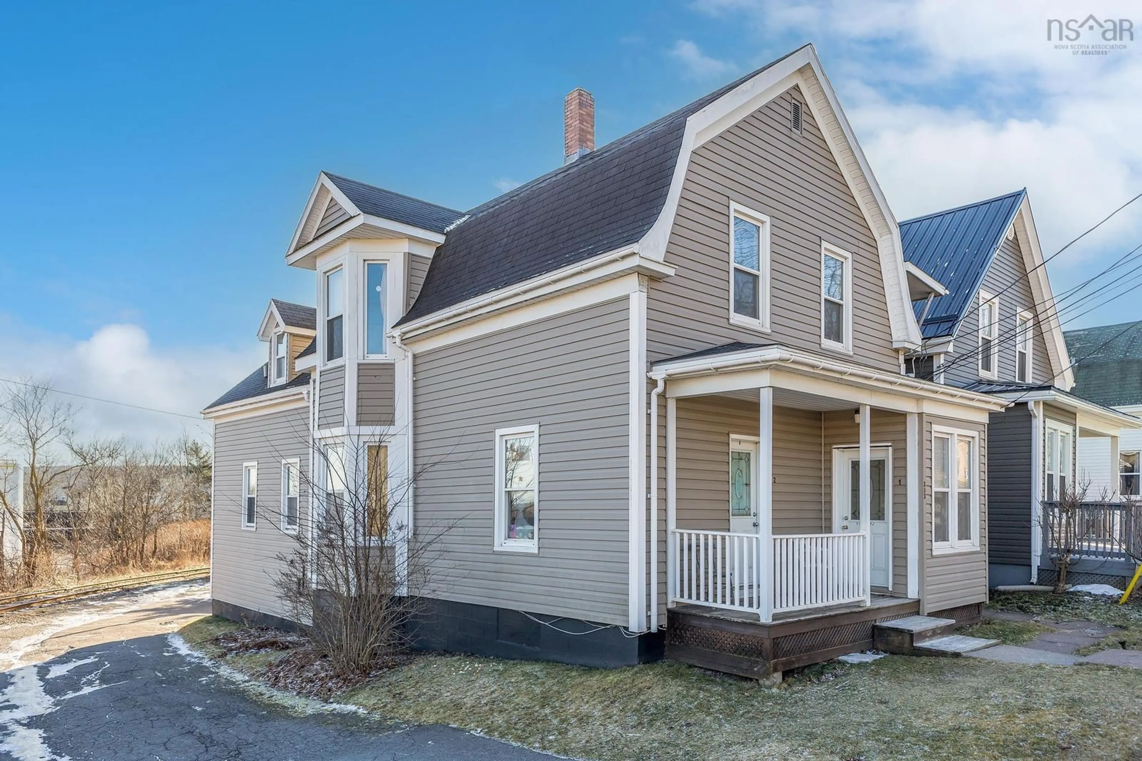 Home with vinyl exterior material, street for 303 South Foord St, Stellarton Nova Scotia B0K 1S0