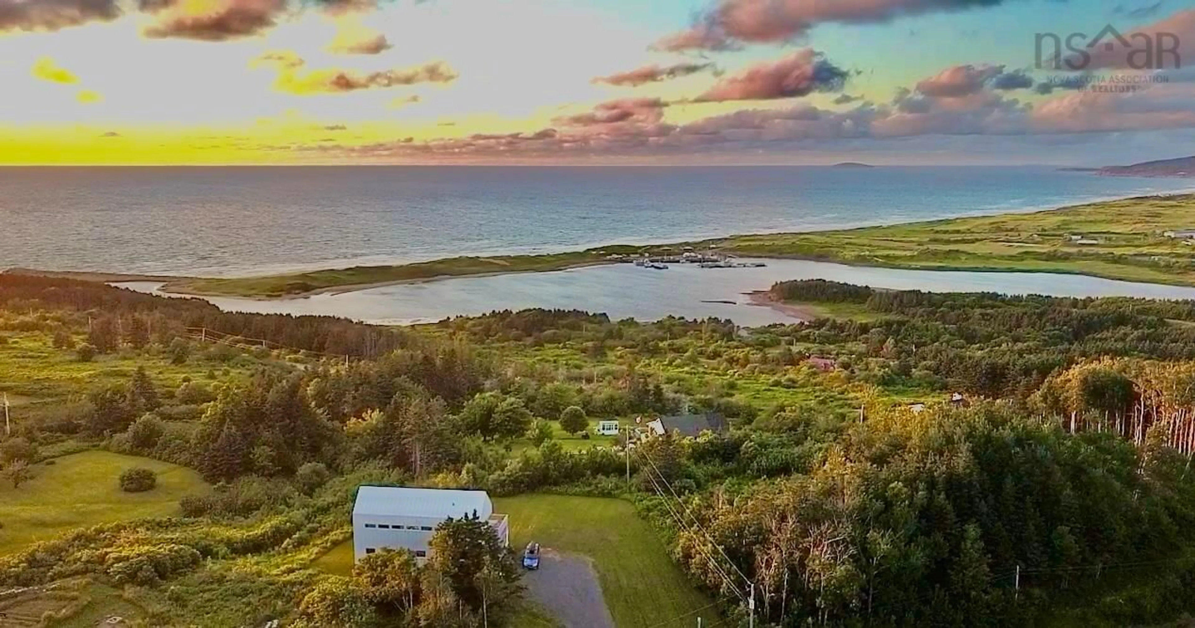 A pic from outside/outdoor area/front of a property/back of a property/a pic from drone, water/lake/river/ocean view for 144 Broad Cove Banks Rd, Inverness Nova Scotia B0E 1N0