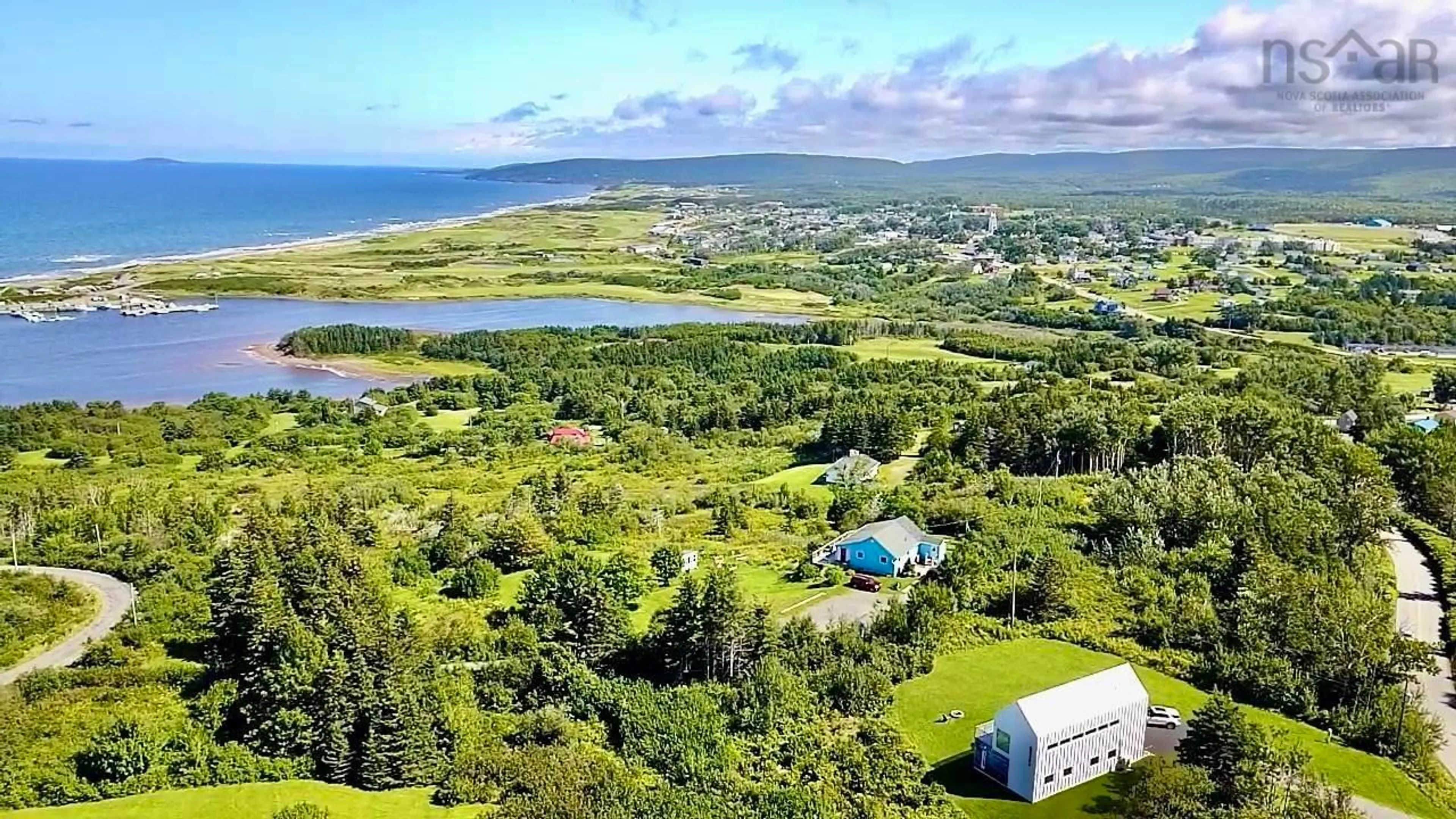 A pic from outside/outdoor area/front of a property/back of a property/a pic from drone, water/lake/river/ocean view for 144 Broad Cove Banks Rd, Inverness Nova Scotia B0E 1N0