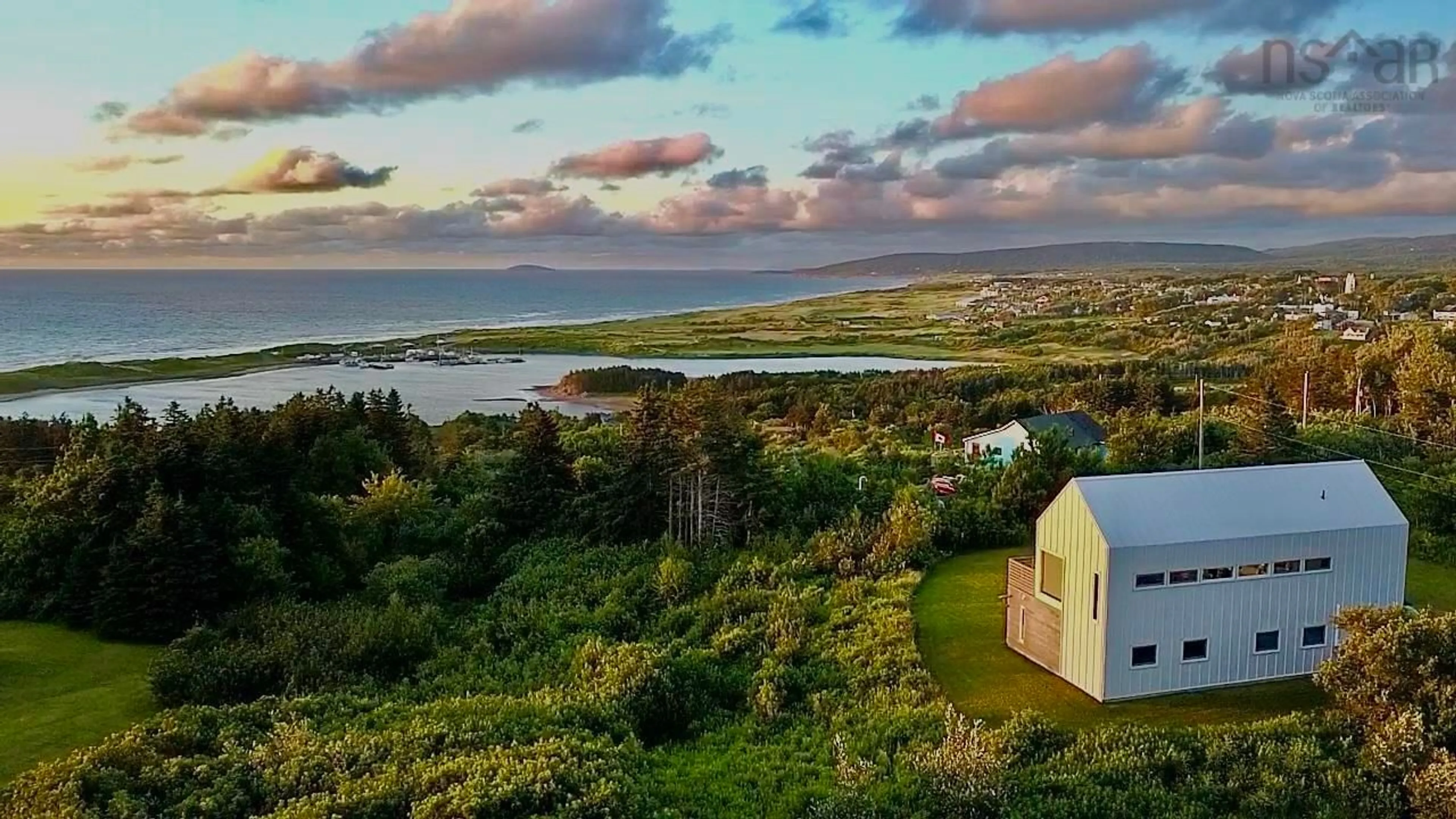 A pic from outside/outdoor area/front of a property/back of a property/a pic from drone, water/lake/river/ocean view for 144 Broad Cove Banks Rd, Inverness Nova Scotia B0E 1N0