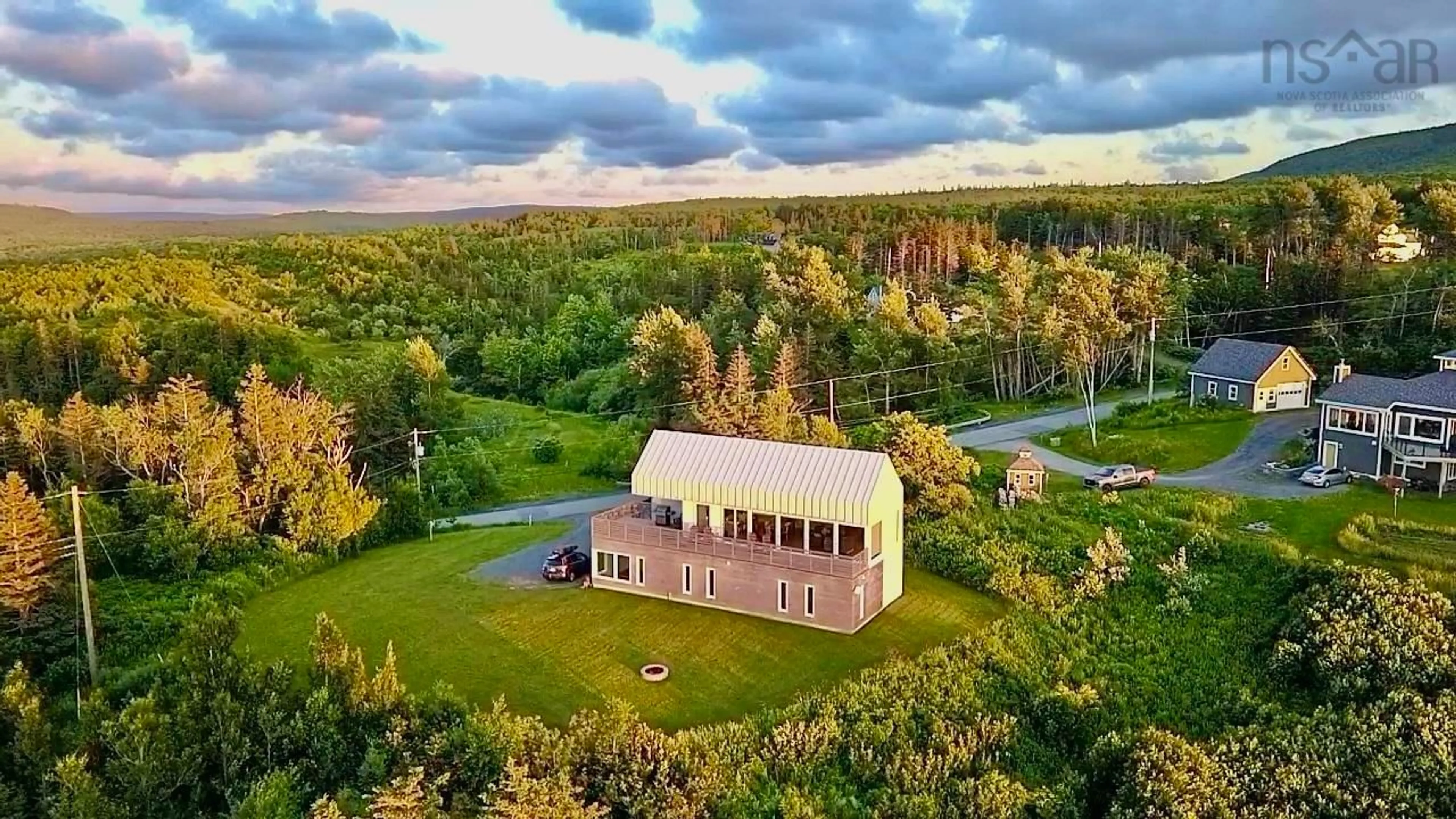 A pic from outside/outdoor area/front of a property/back of a property/a pic from drone, forest/trees view for 144 Broad Cove Banks Rd, Inverness Nova Scotia B0E 1N0