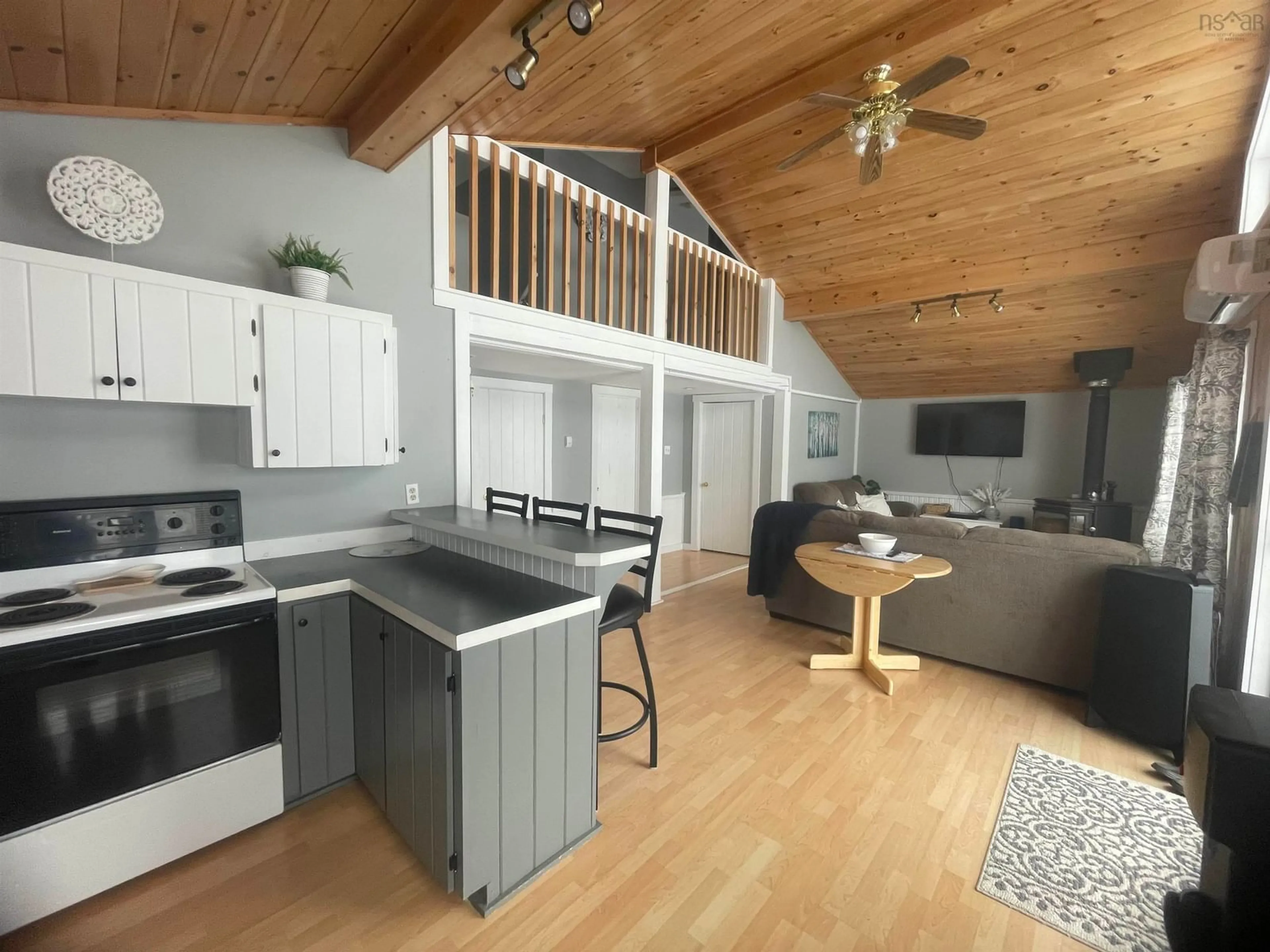 Open concept kitchen, wood/laminate floor for 108 Sluice Dr, Carleton Nova Scotia B5A 5P8