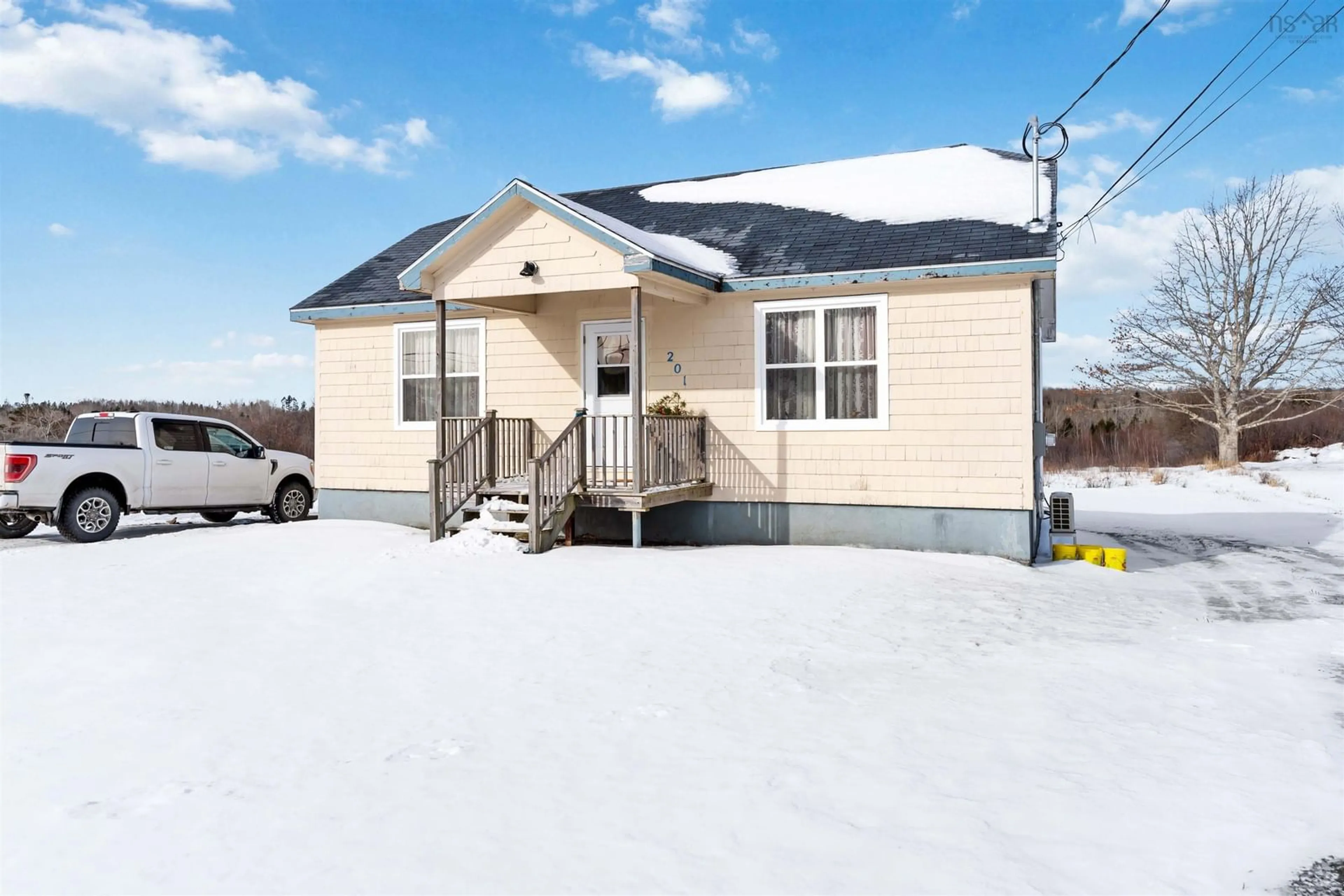 Home with vinyl exterior material, street for 201 Flat Iron Rd, Conway Nova Scotia B0V 1A0