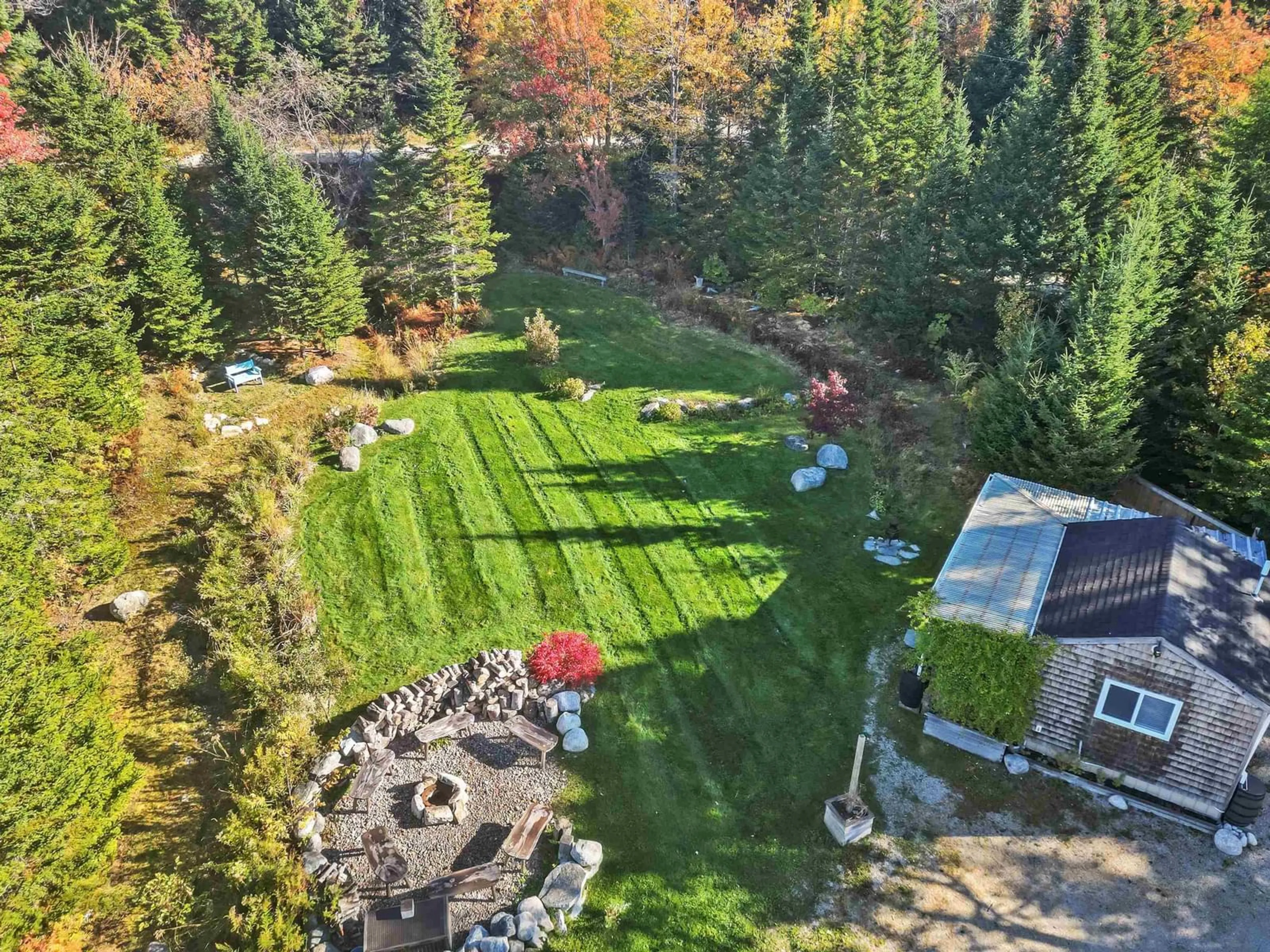 A pic from outside/outdoor area/front of a property/back of a property/a pic from drone, forest/trees view for 8493 St Margarets Bay Rd, Black Point Nova Scotia B0J 1B0