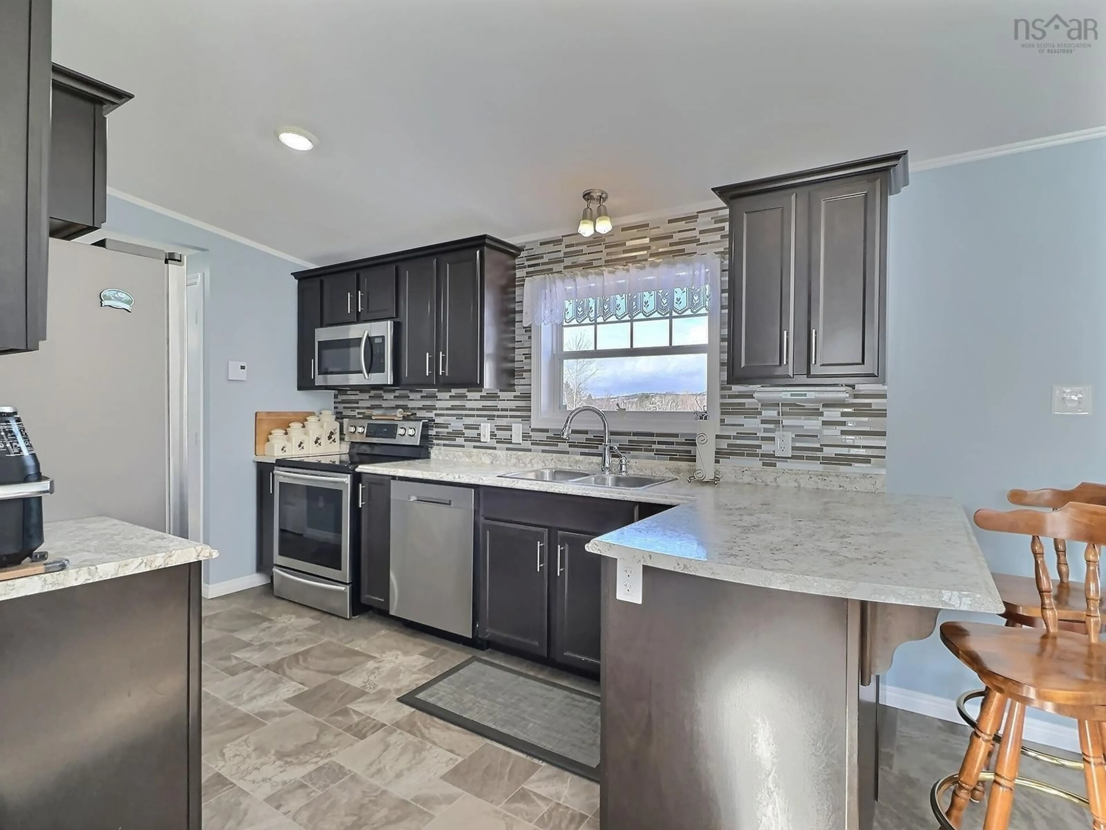 Open concept kitchen, ceramic/tile floor for 9 Bartlett Ave, Valley Nova Scotia B2N 5V5