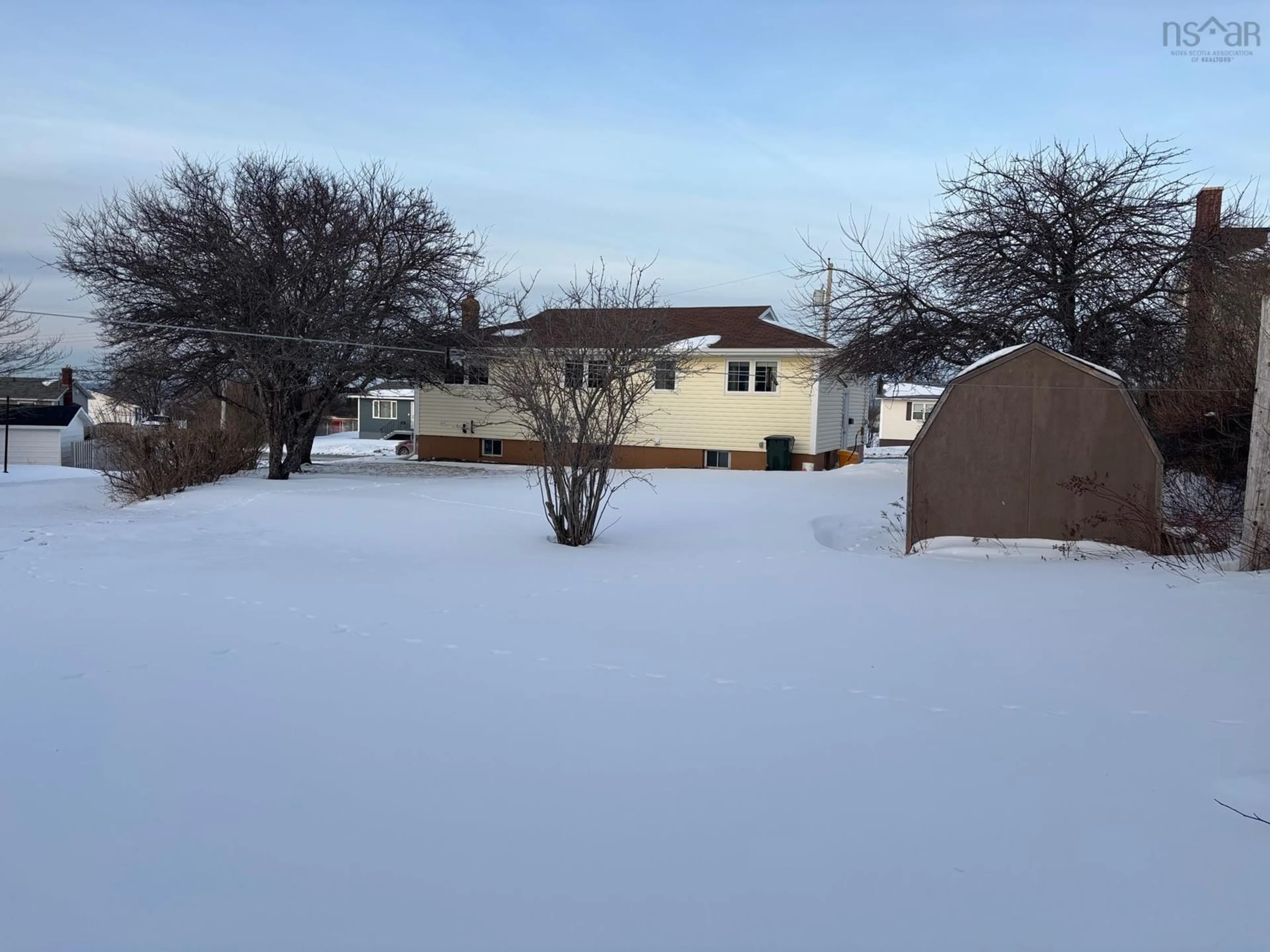 A pic from outside/outdoor area/front of a property/back of a property/a pic from drone, street for 3196 Sunset Ave, New Waterford Nova Scotia B1H 1K9