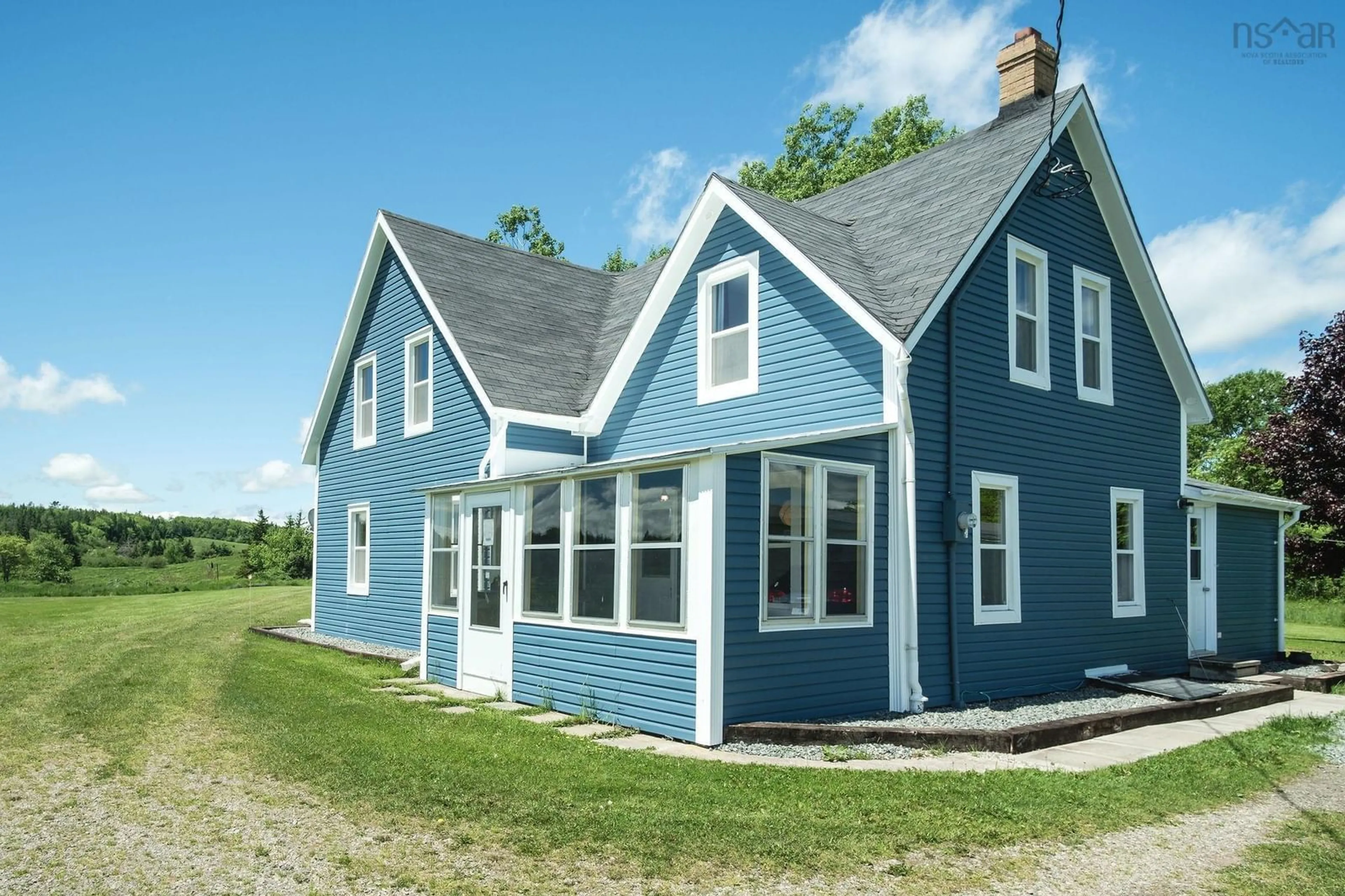 Home with vinyl exterior material, building for 10353 Marble Mountain Rd, Orangedale Nova Scotia B0E 2K0