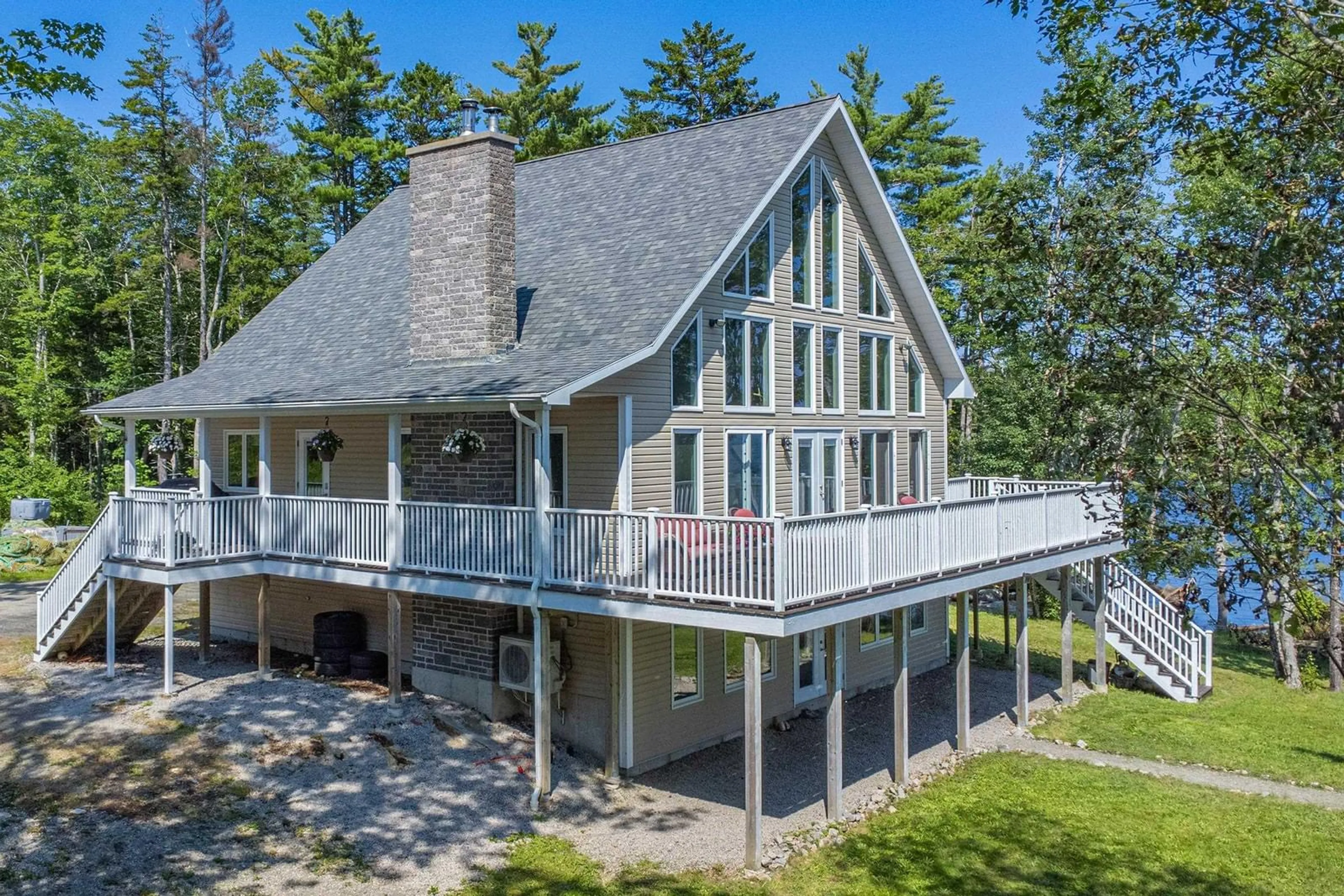 A pic from outside/outdoor area/front of a property/back of a property/a pic from drone, water/lake/river/ocean view for 320 Canaan Rd, Gavelton Nova Scotia B0W 3M0