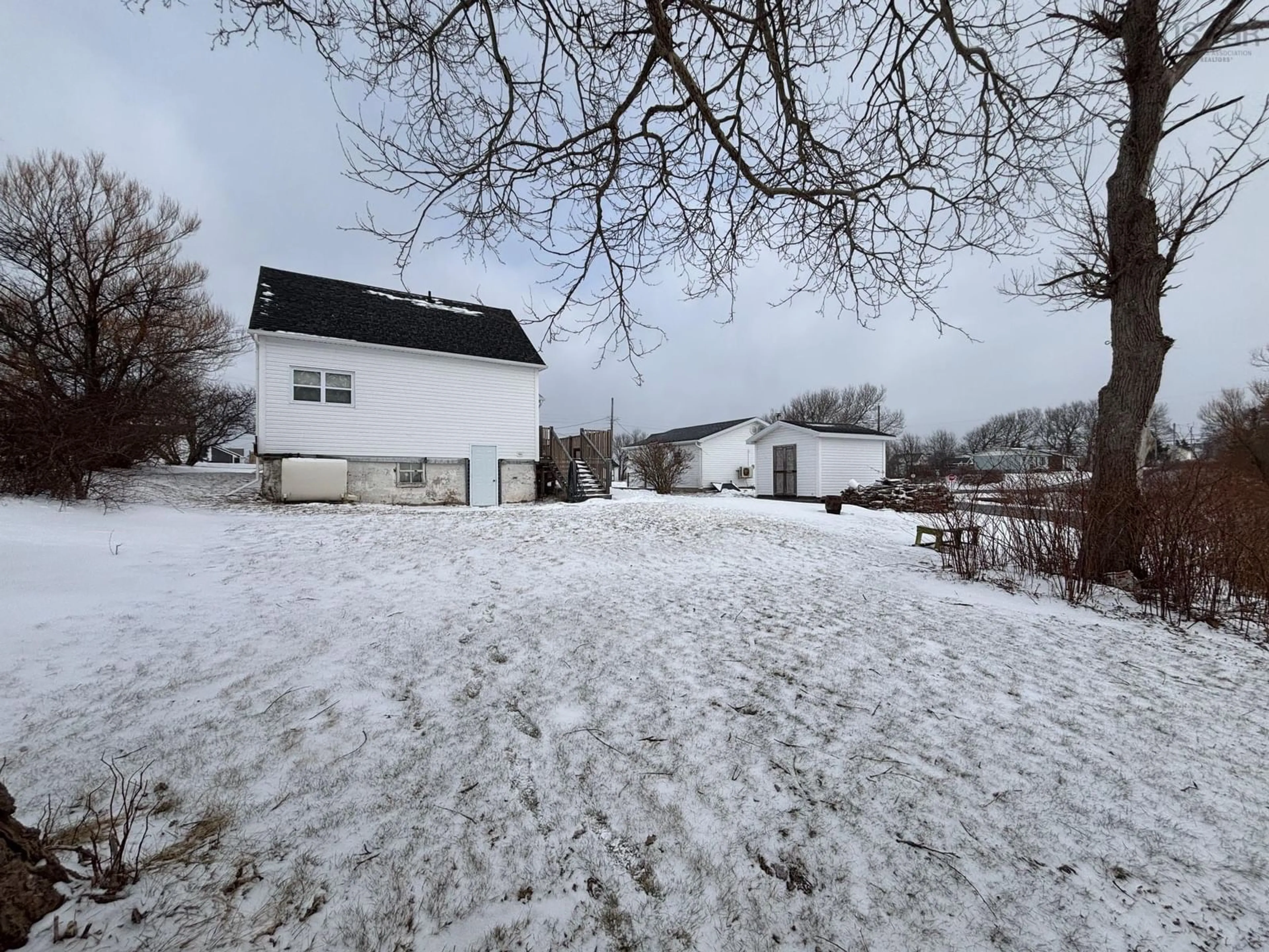 A pic from outside/outdoor area/front of a property/back of a property/a pic from drone, unknown for 3524 Bay Ave, New Waterford Nova Scotia B1H 2P3