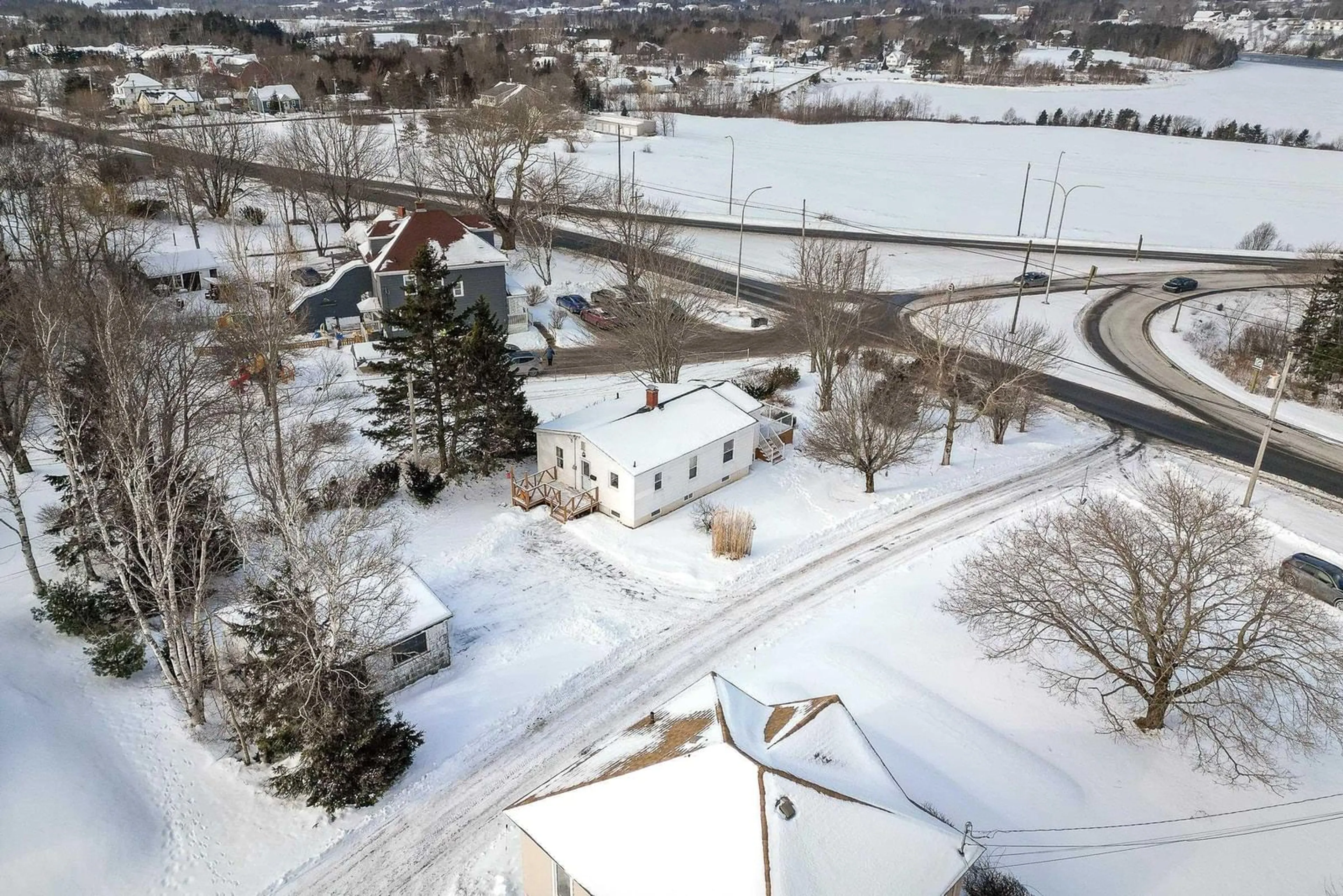 A pic from outside/outdoor area/front of a property/back of a property/a pic from drone, street for 1551 Kings Road, Sydney River Nova Scotia B1S 1E8