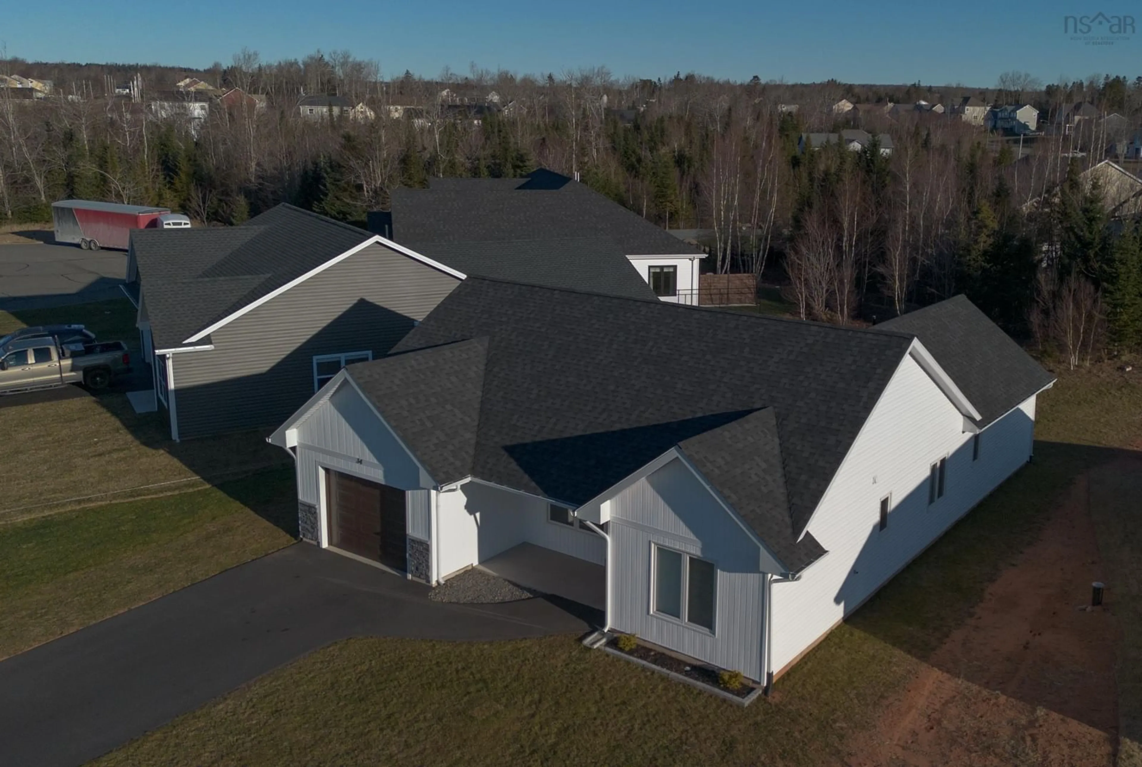 A pic from outside/outdoor area/front of a property/back of a property/a pic from drone, unknown for 34 Oxford Crt, Valley Nova Scotia B6L 0C1