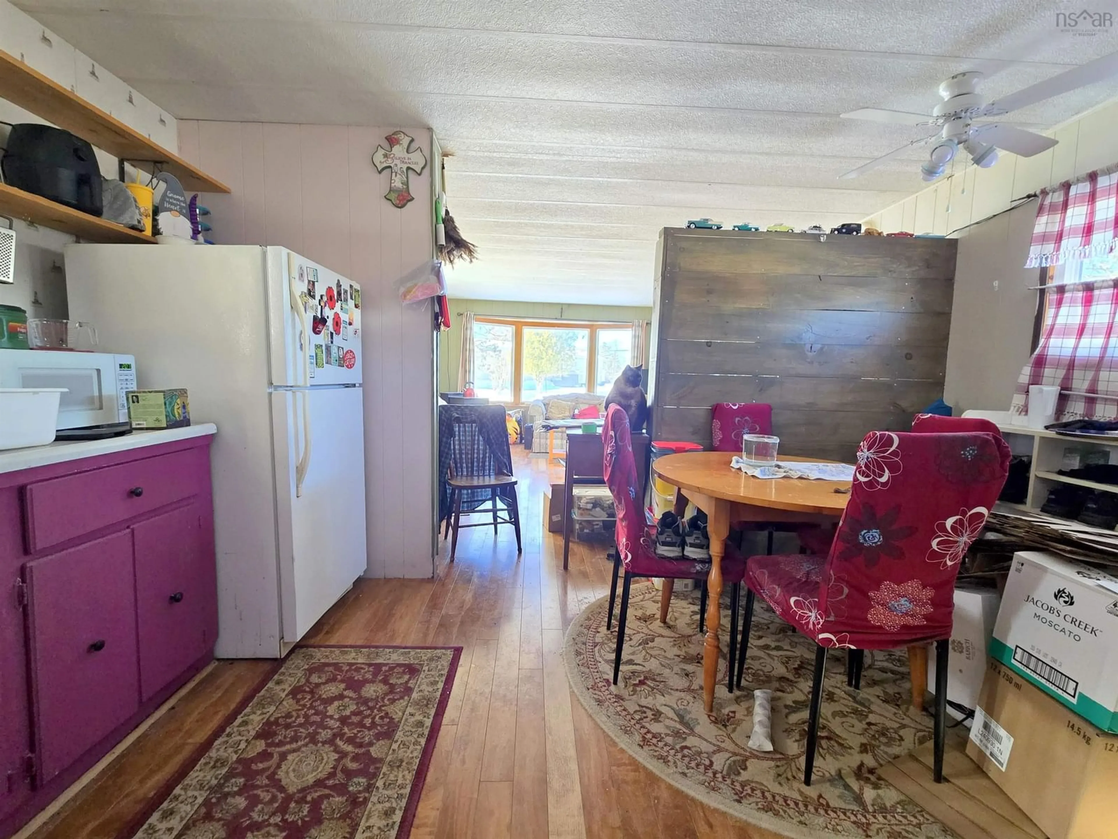 Dining room, wood/laminate floor for 15 Lorne Cres, Amherst Nova Scotia B4H 4B7