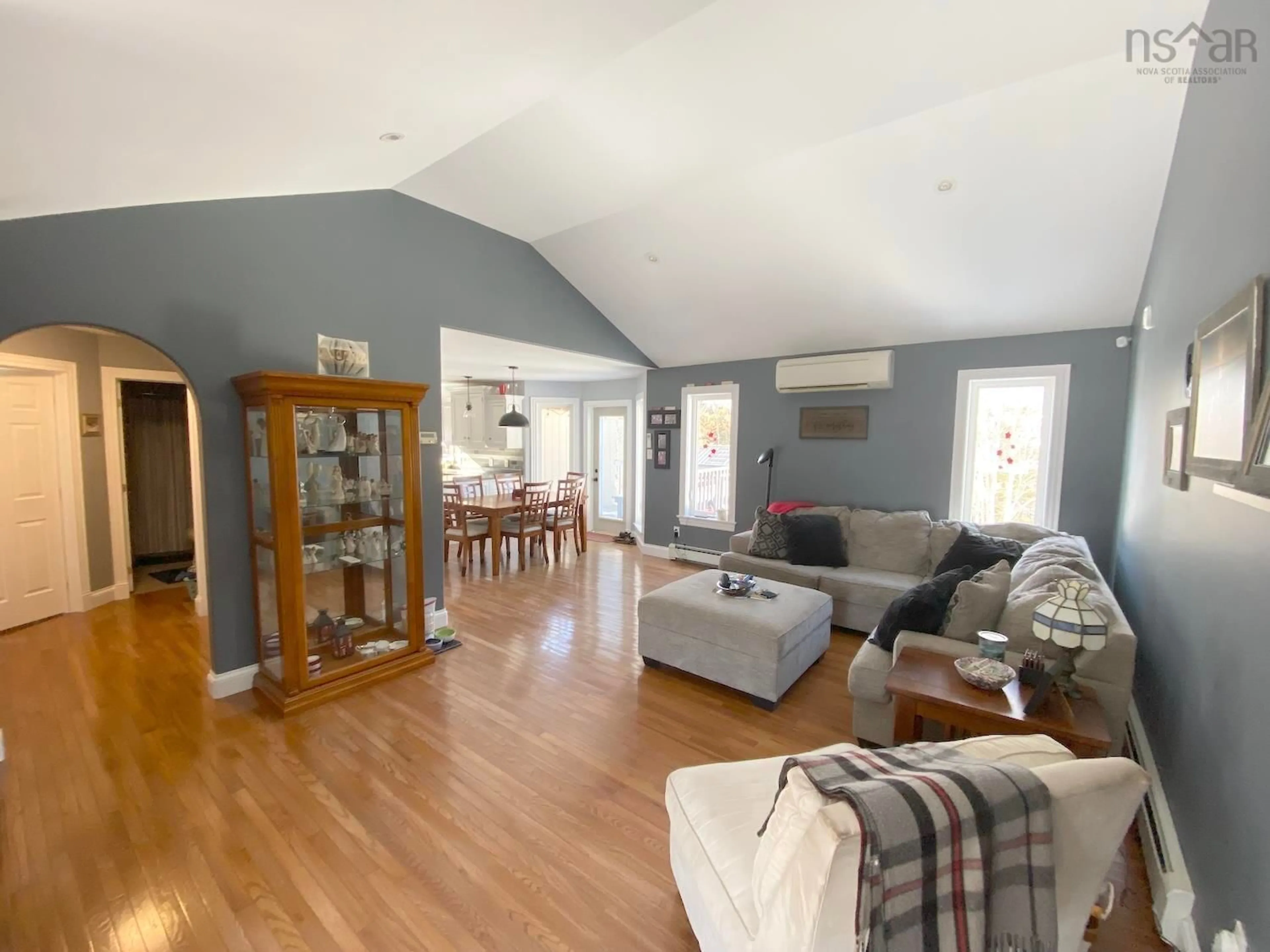 Living room with furniture, wood/laminate floor for 81 Sandy Pl, Valley Nova Scotia B6L 4G4