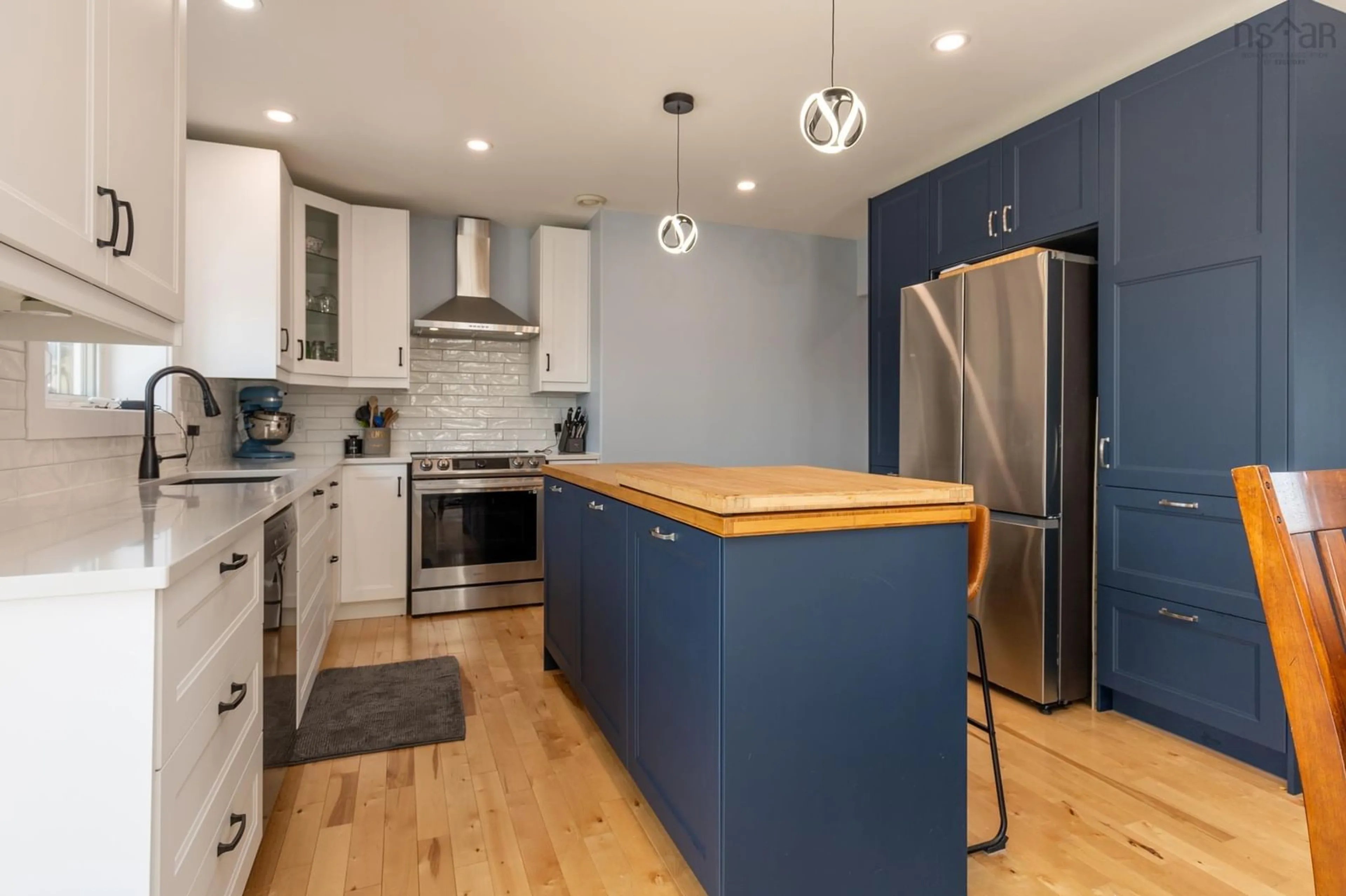 Open concept kitchen, wood/laminate floor for 9 Breeze Dr, Yarmouth Nova Scotia B5A 4V1