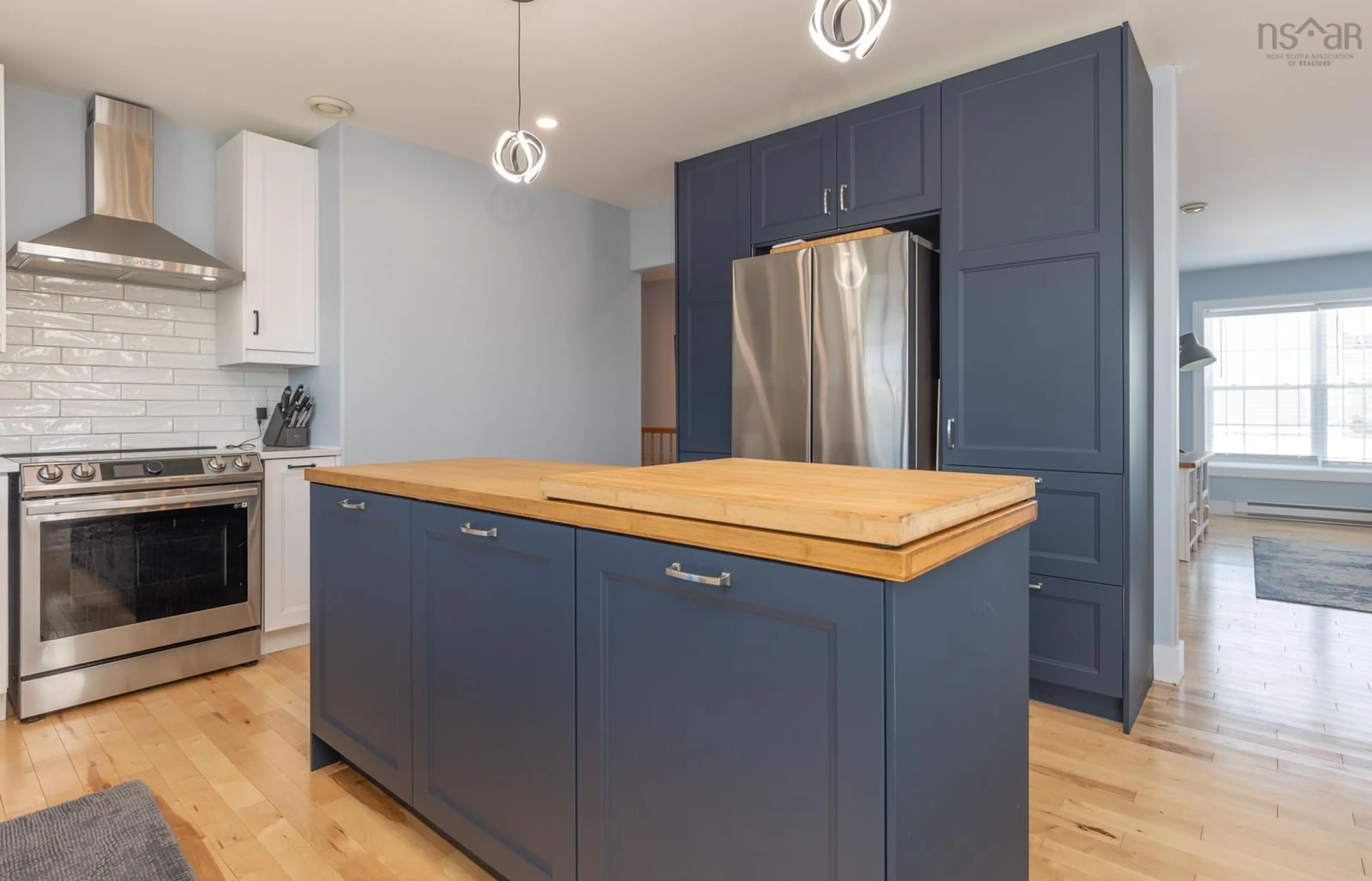 Open concept kitchen, wood/laminate floor for 9 Breeze Dr, Yarmouth Nova Scotia B5A 4V1