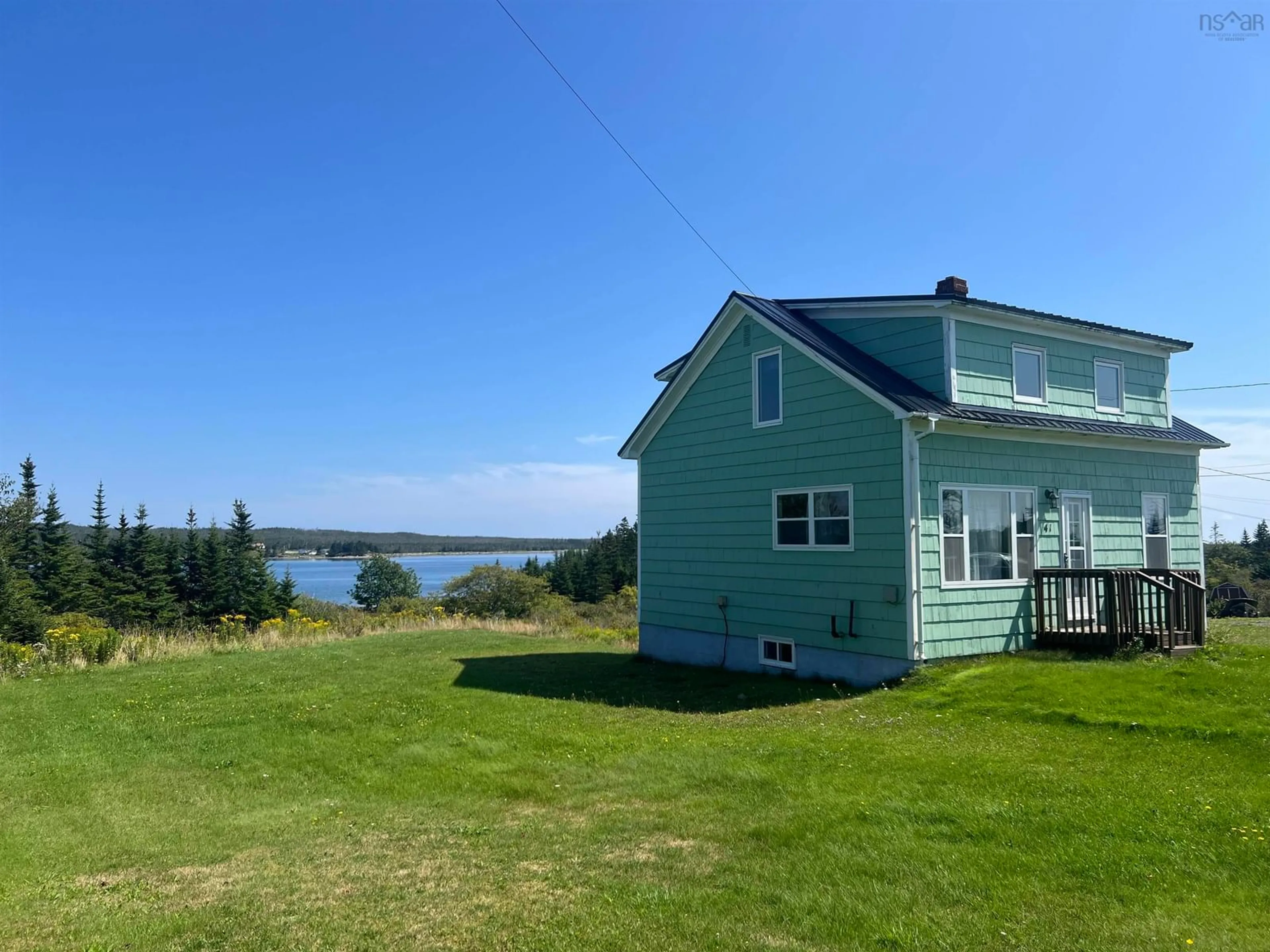 A pic from outside/outdoor area/front of a property/back of a property/a pic from drone, water/lake/river/ocean view for 41 Port Bickerton Village Rd, Port Bickerton Nova Scotia B0J 1A0