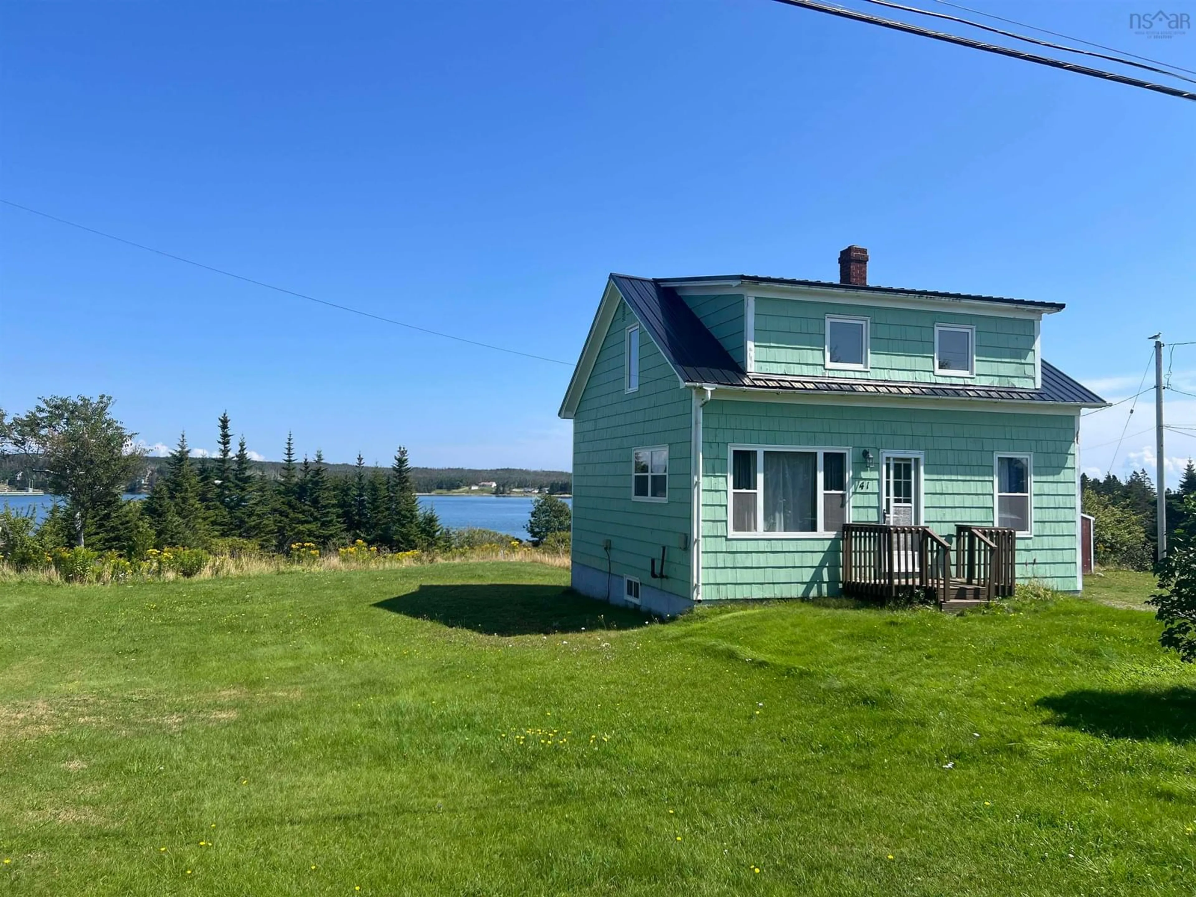 A pic from outside/outdoor area/front of a property/back of a property/a pic from drone, water/lake/river/ocean view for 41 Port Bickerton Village Rd, Port Bickerton Nova Scotia B0J 1A0