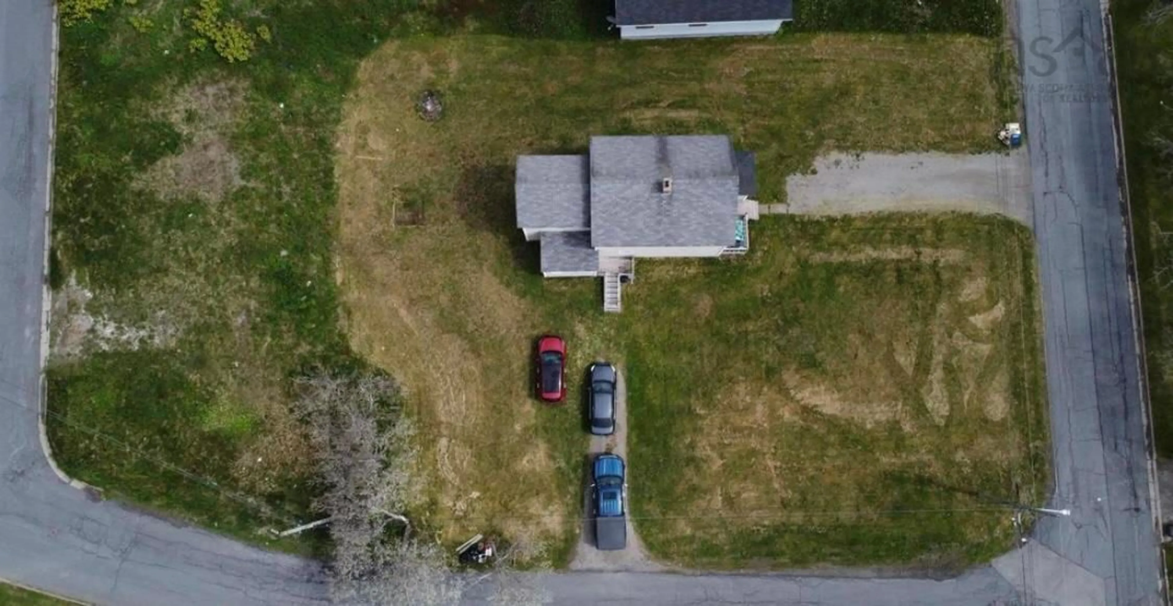 A pic from outside/outdoor area/front of a property/back of a property/a pic from drone, street for 263 Ling St, New Waterford Nova Scotia B1H 2W3