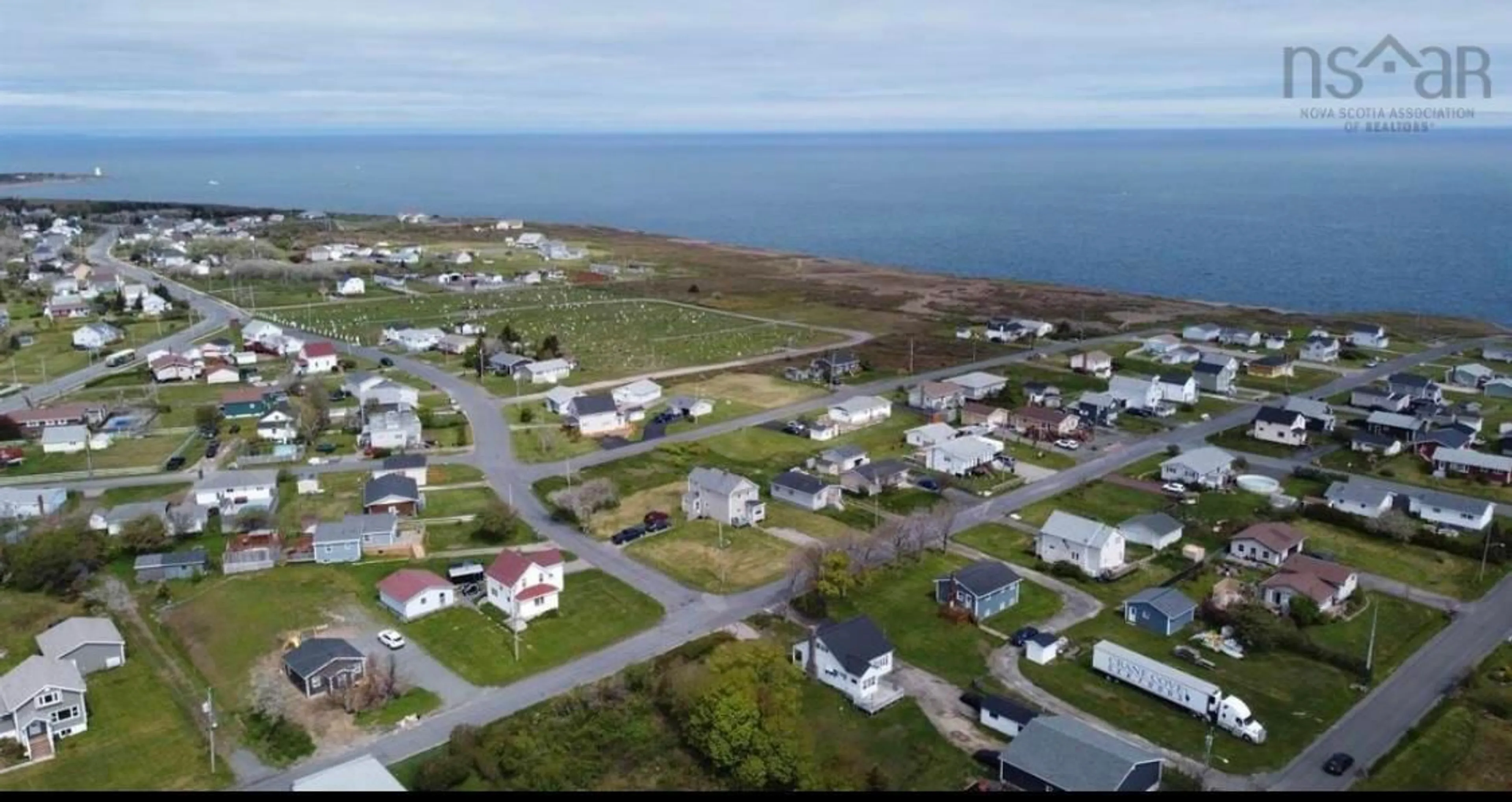 A pic from outside/outdoor area/front of a property/back of a property/a pic from drone, street for 263 Ling St, New Waterford Nova Scotia B1H 2W3